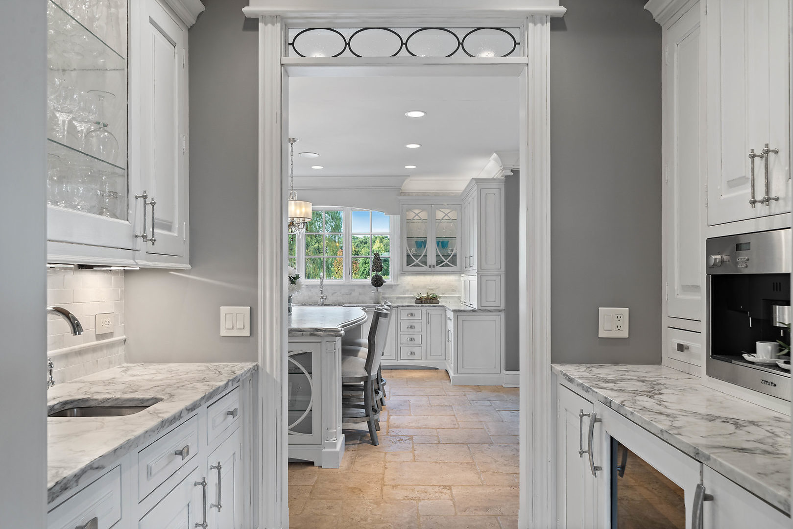 36W516 Hunters Gate Road St. Charles, IL 60175 - Photo 9 of 47 a kitchen with a sink cabinets and window