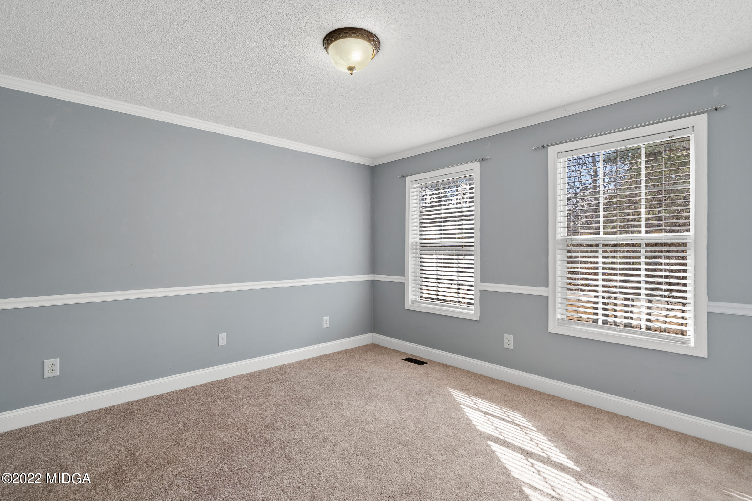245 Lite-N-Tie Road Gray, GA 31032 - Photo 19 of 29 a view of an empty room with a window