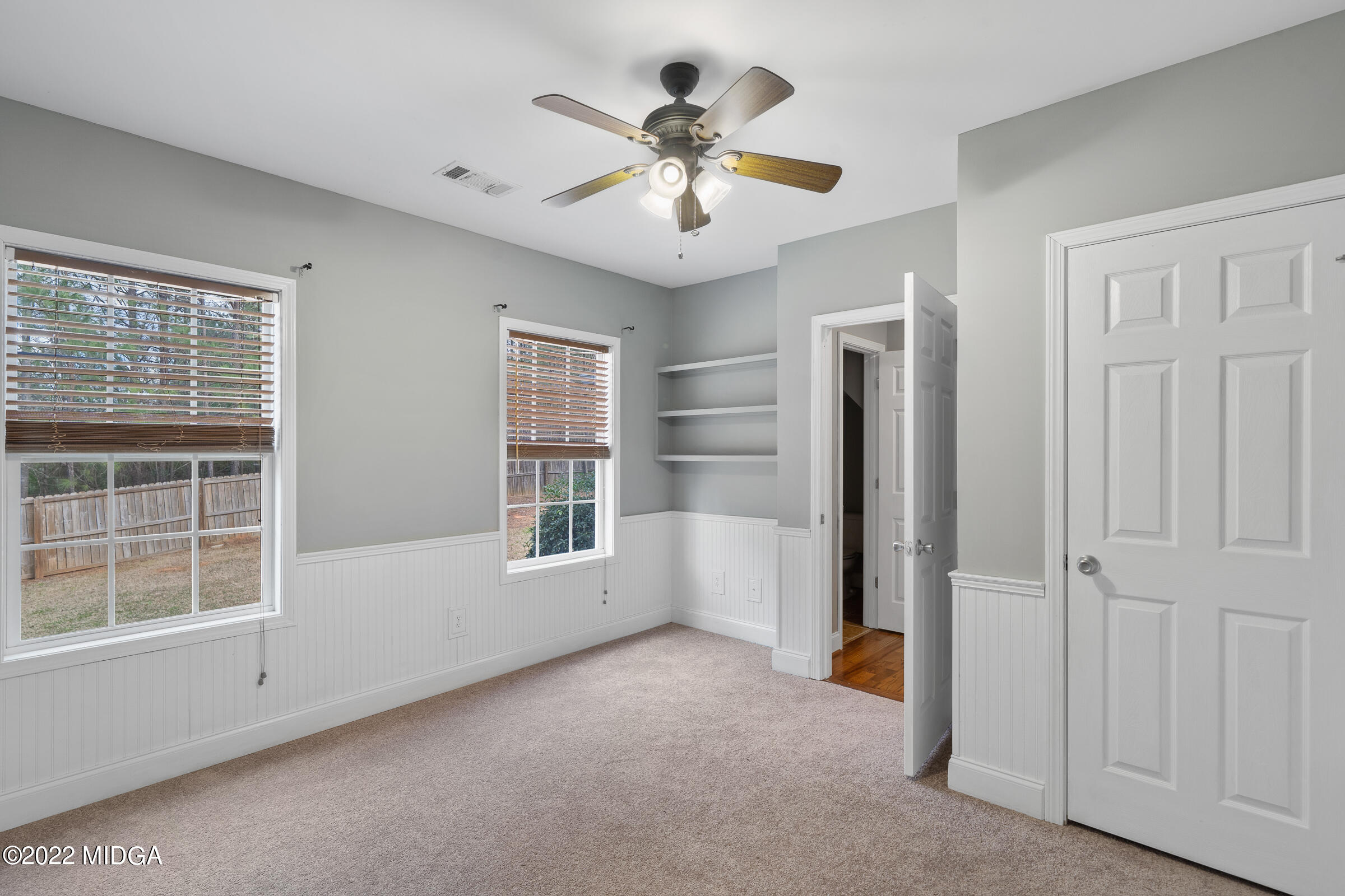 245 Lite-N-Tie Road Gray, GA 31032 - Photo 21 of 29 wooden floor in an empty room with a window