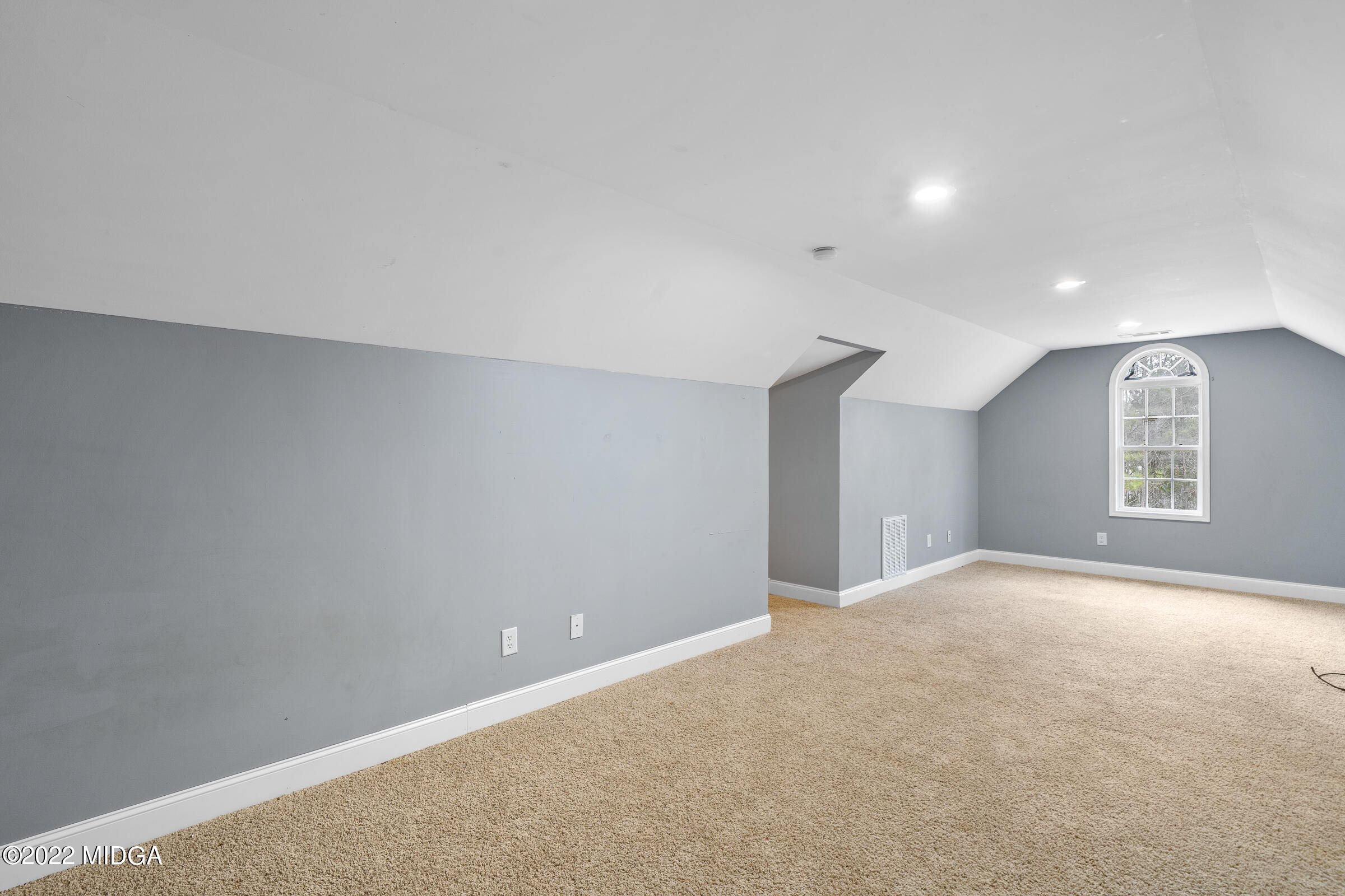 245 Lite-N-Tie Road Gray, GA 31032 - Photo 23 of 29 a view of an empty room with a window