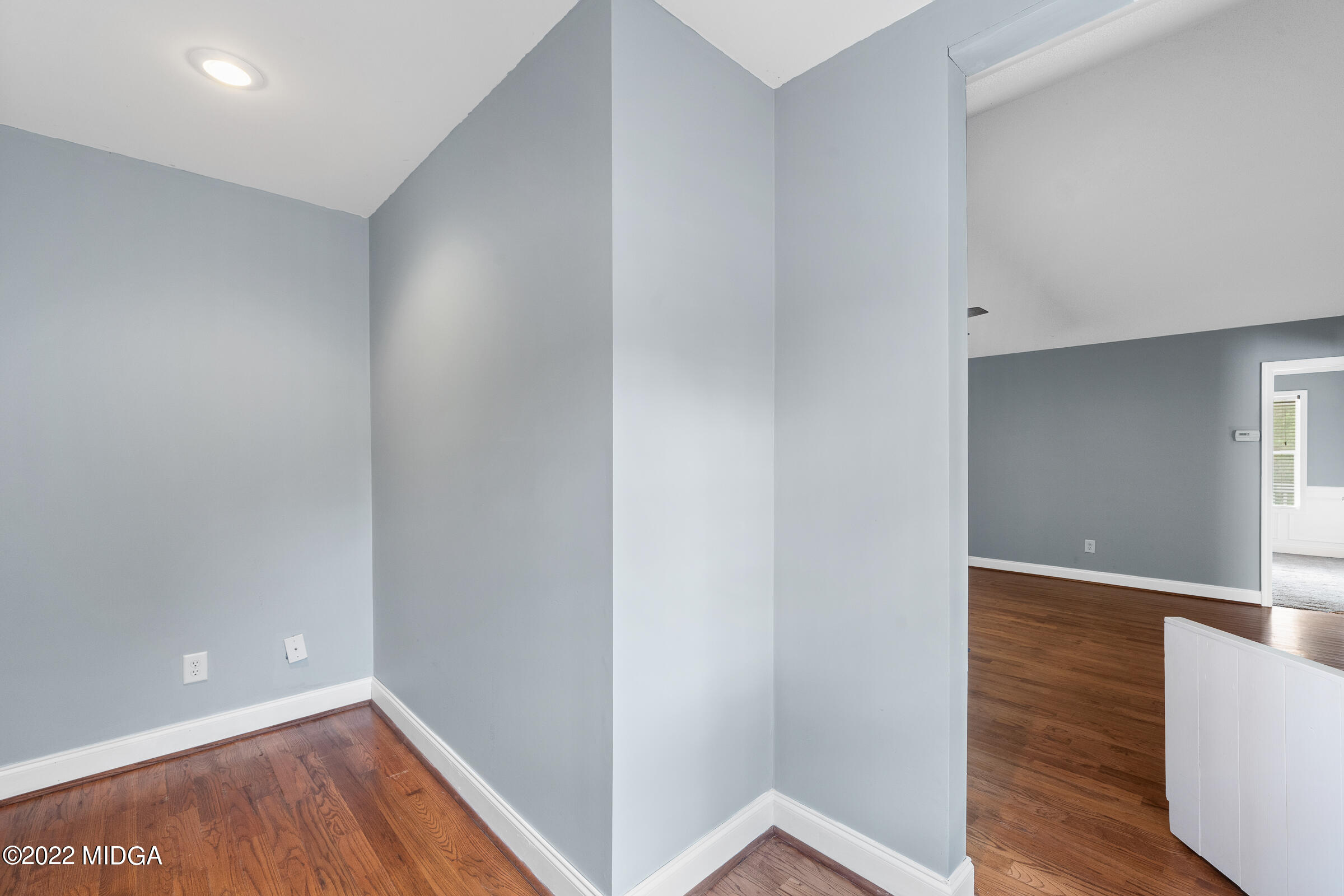 245 Lite-N-Tie Road Gray, GA 31032 - Photo 26 of 29 a view of an empty room with wooden floor