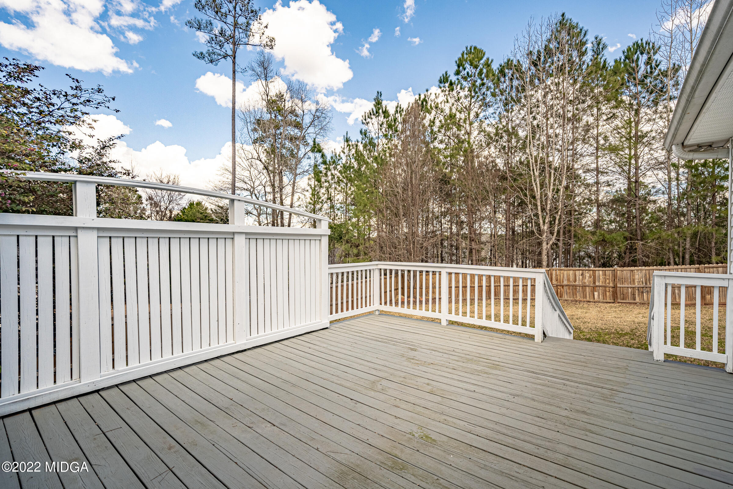 245 Lite-N-Tie Road Gray, GA 31032 - Photo 27 of 29 a view of a wooden deck
