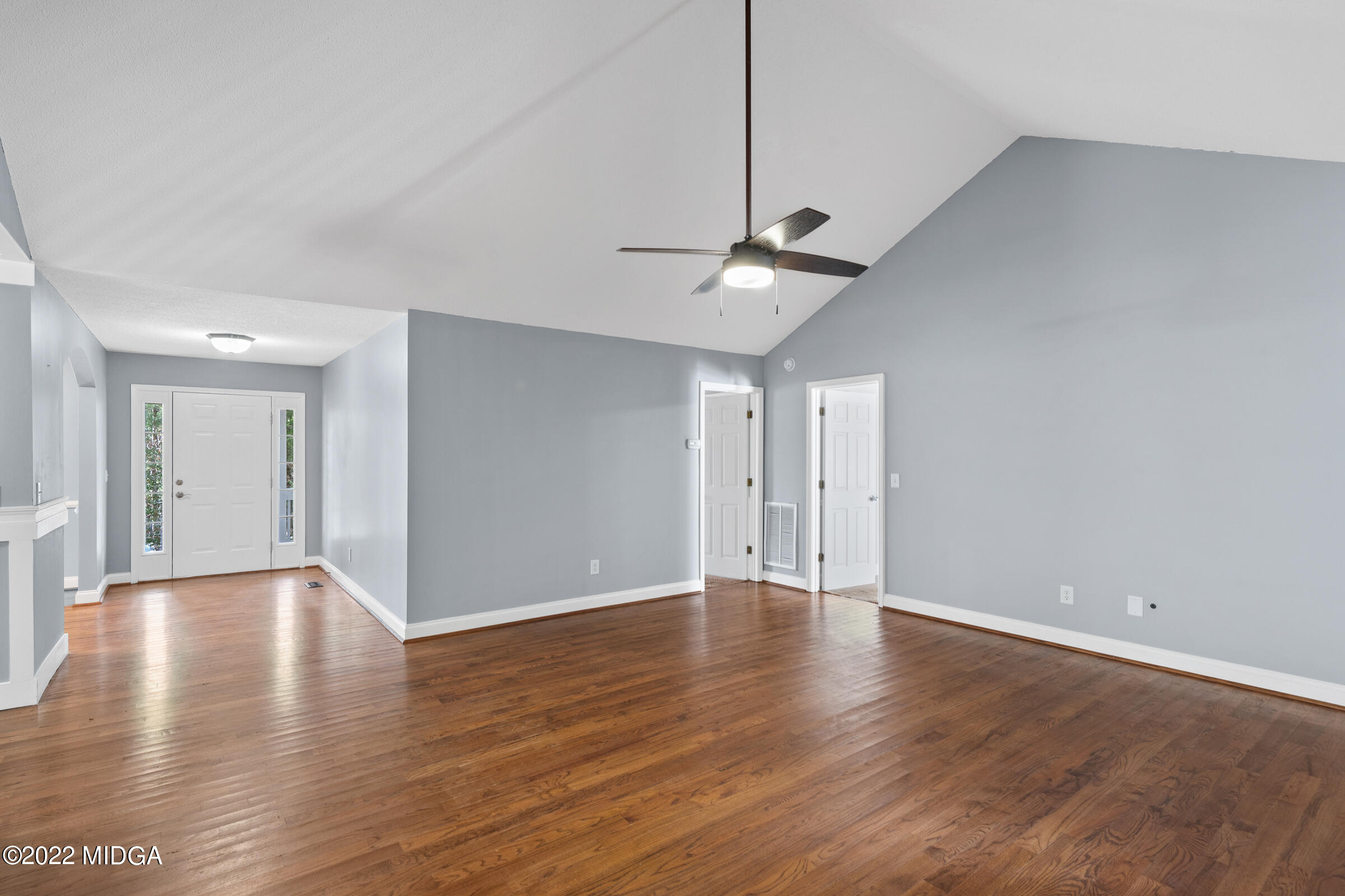 245 Lite-N-Tie Road Gray, GA 31032 - Photo 5 of 29 a view of an empty room with wooden floor