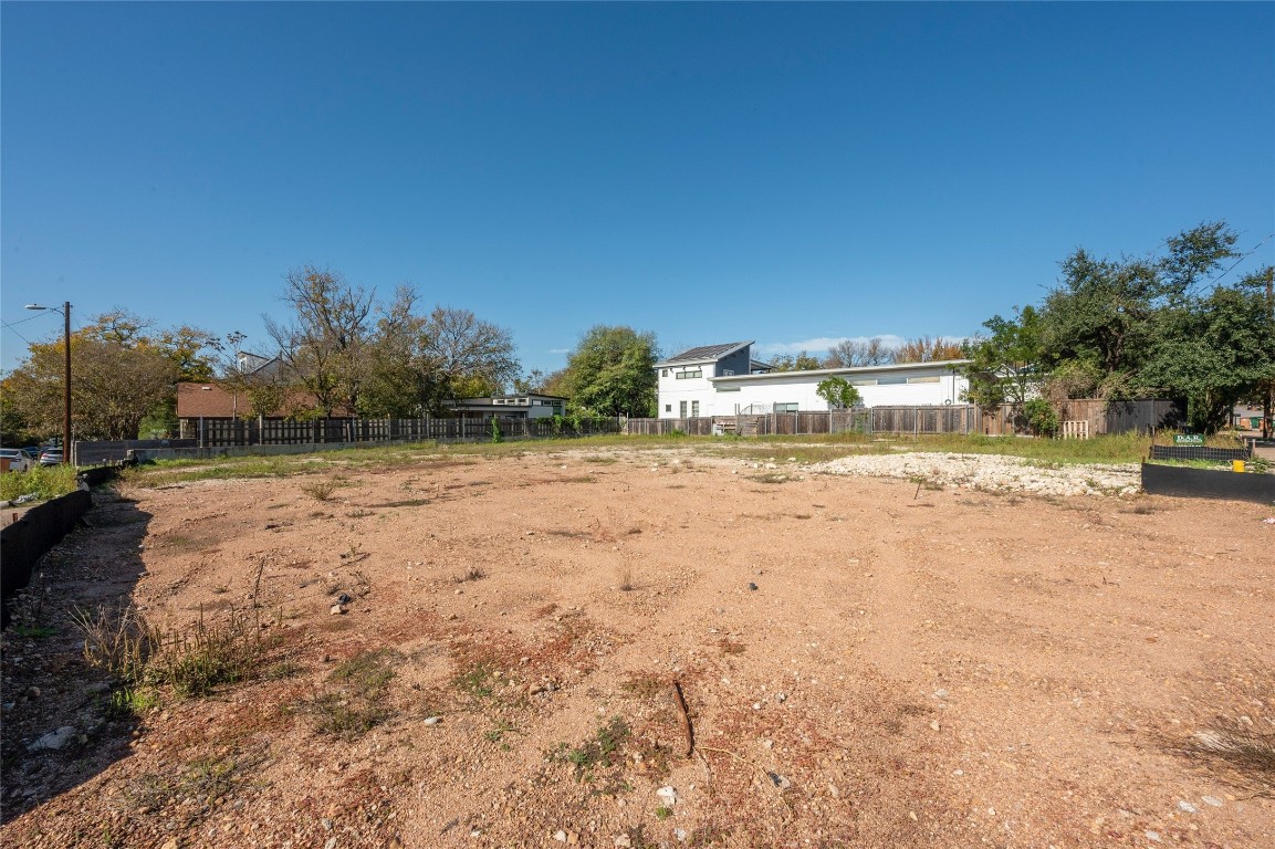 a view of a yard with an trees