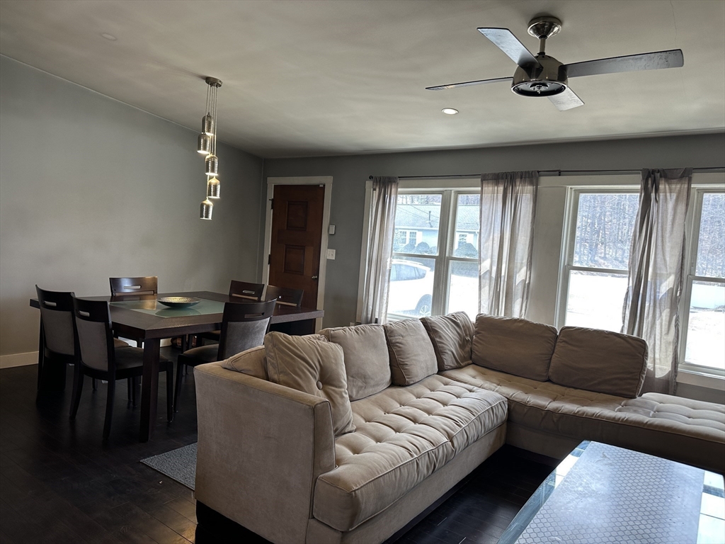 153 Freeman Street Haverhill, MA 01832 - Photo 12 of 31 a living room with furniture and a large window