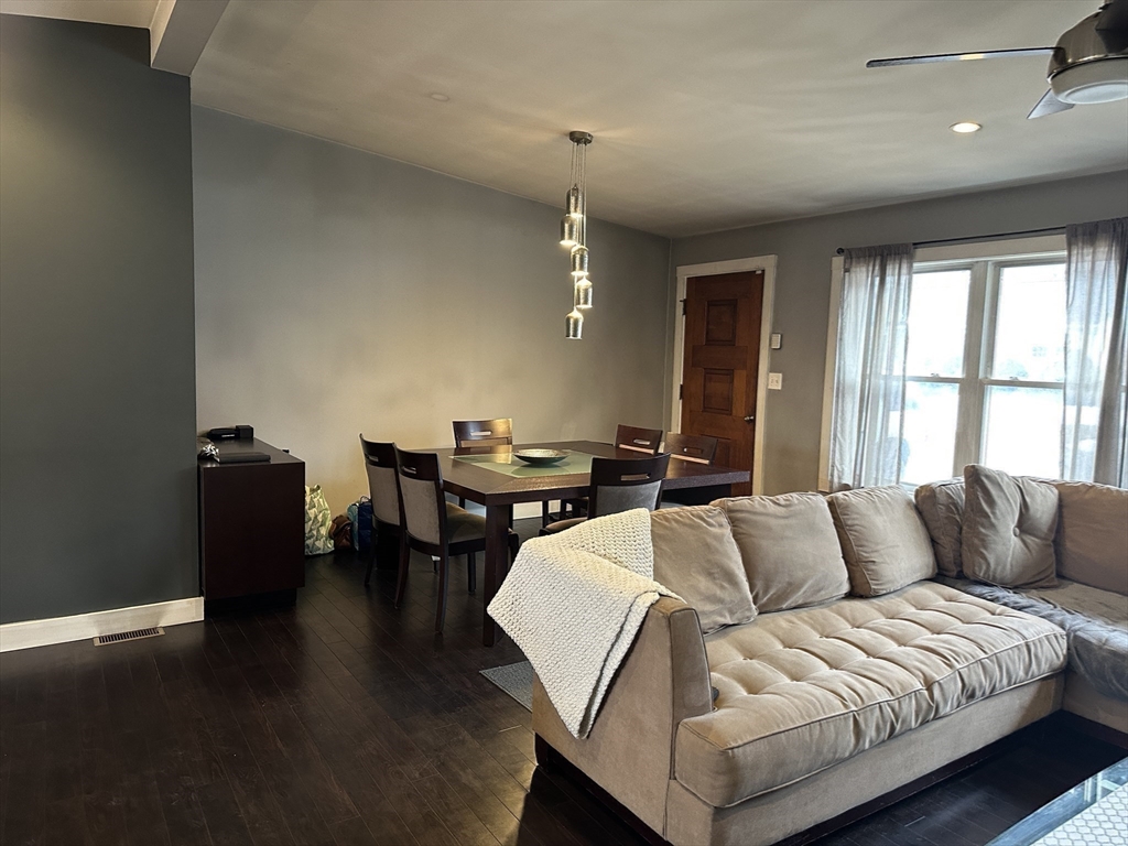 153 Freeman Street Haverhill, MA 01832 - Photo 13 of 31 a living room with furniture and wooden floor
