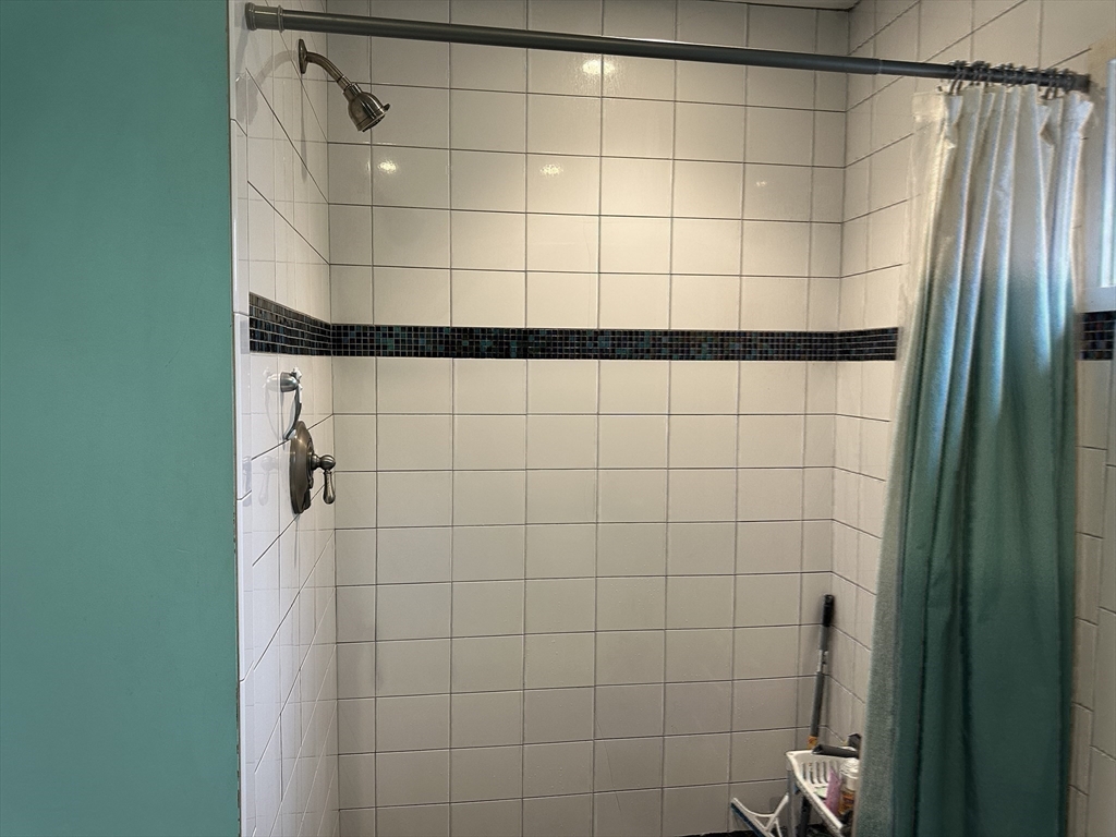 153 Freeman Street Haverhill, MA 01832 - Photo 17 of 31 a bathroom with a shower