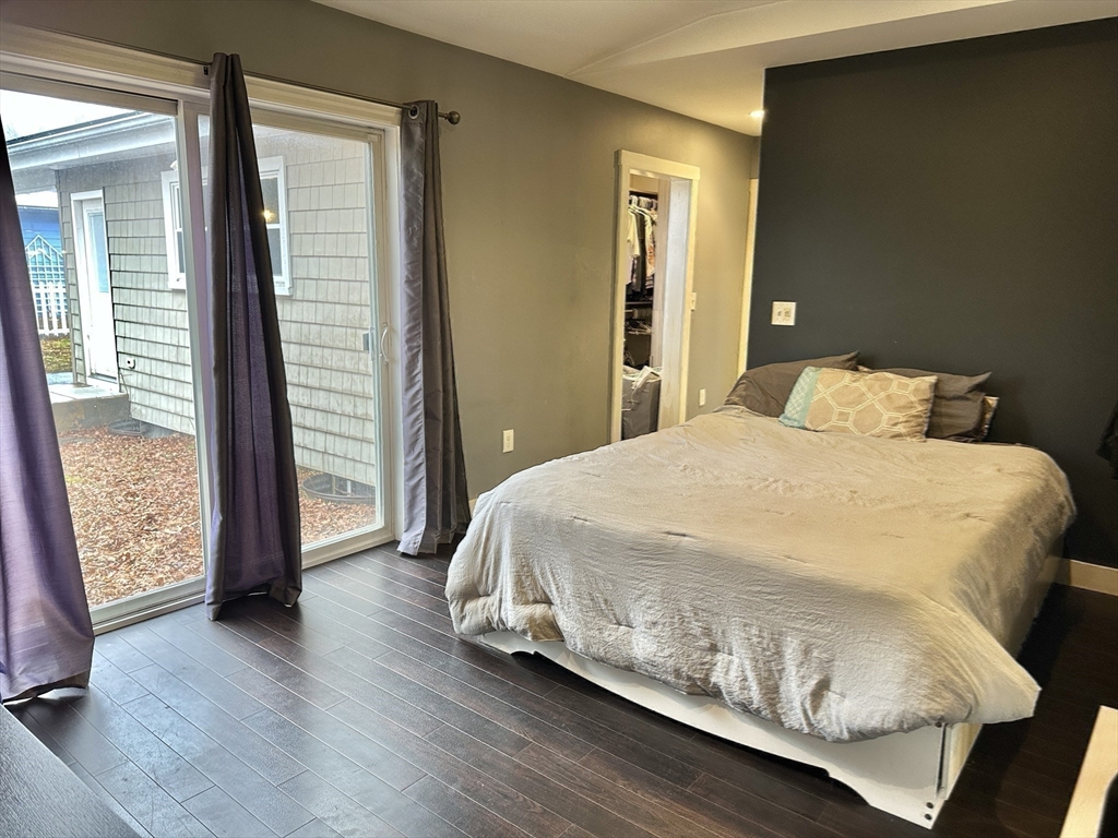 153 Freeman Street Haverhill, MA 01832 - Photo 20 of 31 a large bed sitting in a bedroom next to a window