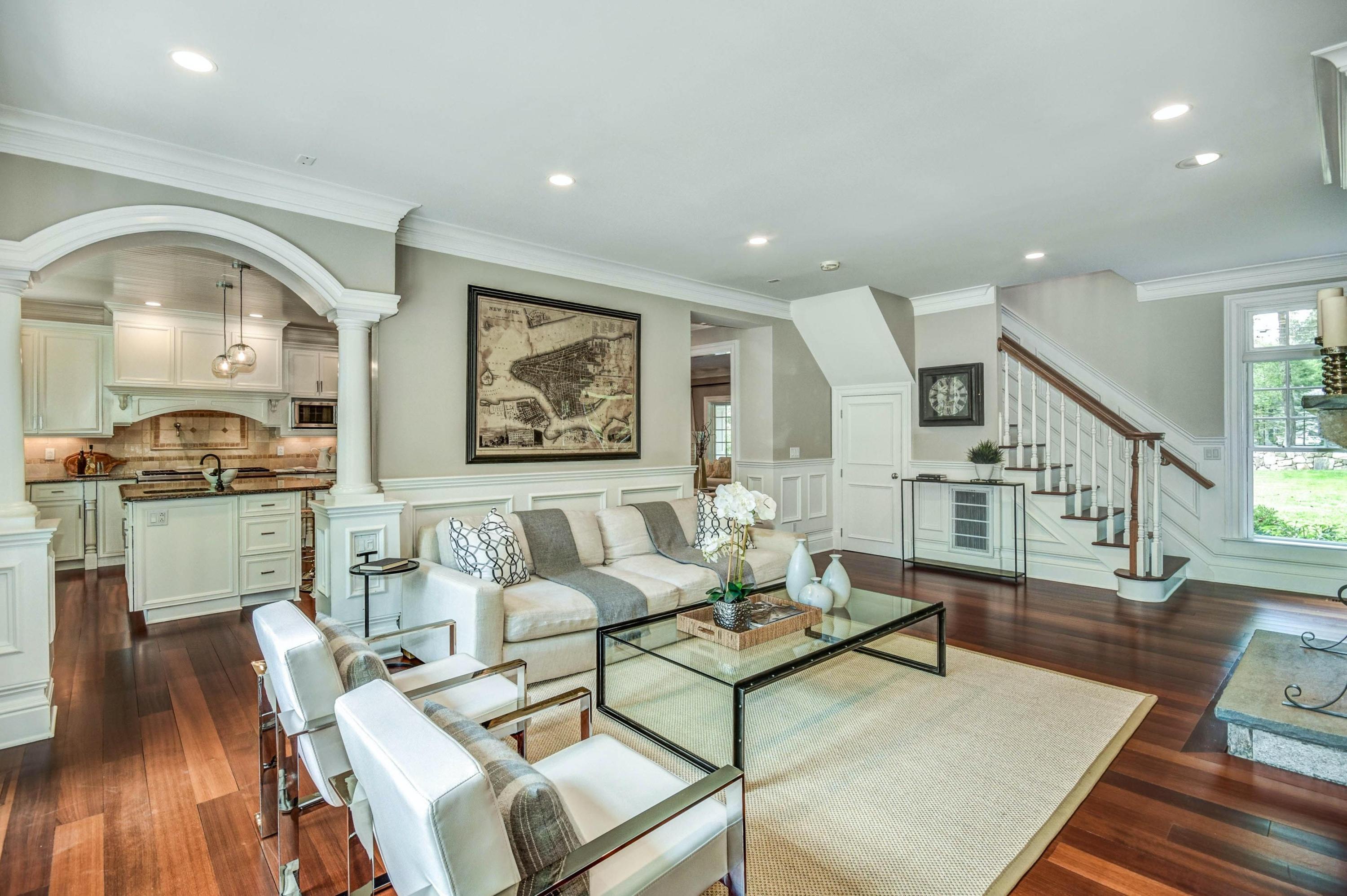 56 Logan Road New Canaan, CT 06840 - Photo 16 of 40 a living room with furniture and wooden floor