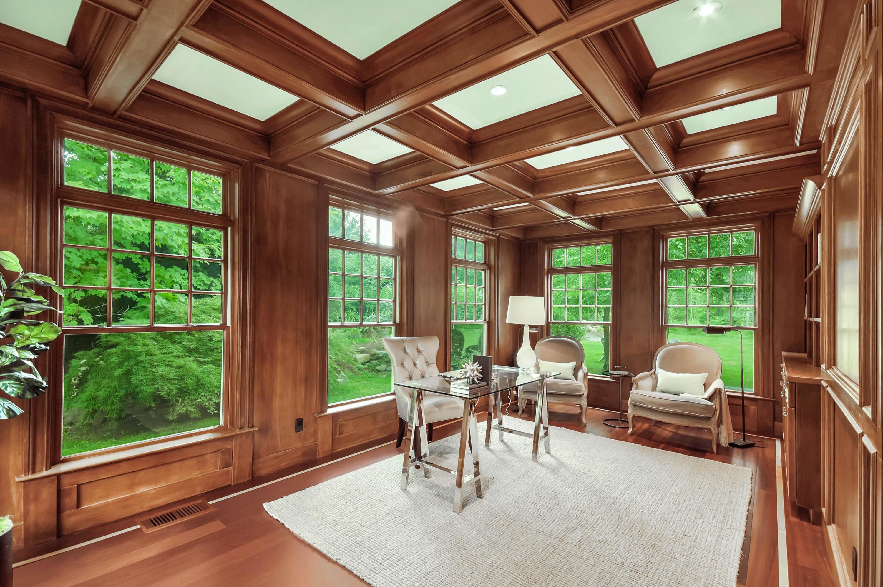 56 Logan Road New Canaan, CT 06840 - Photo 20 of 40 a living room with furniture and a large window