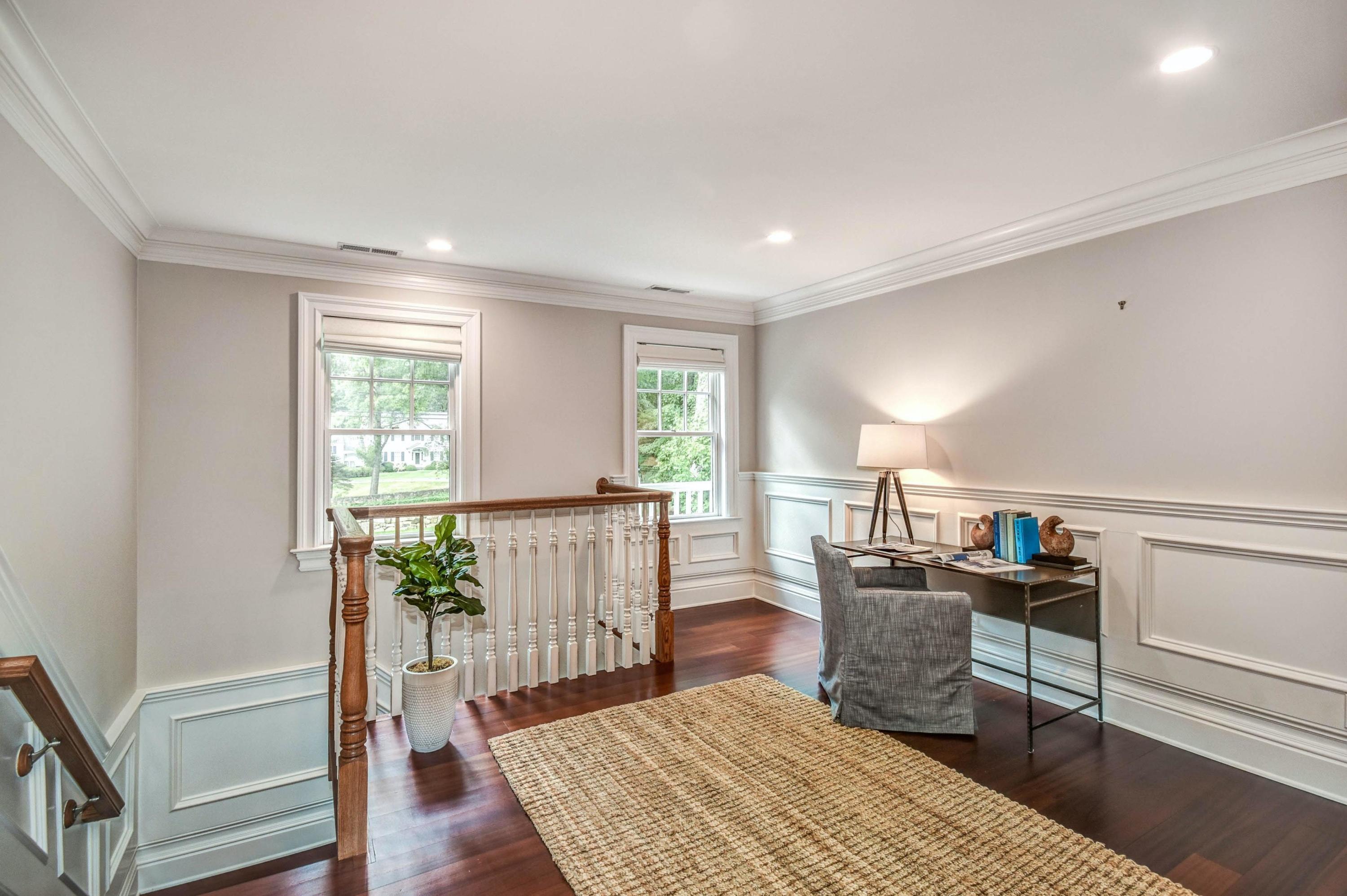 56 Logan Road New Canaan, CT 06840 - Photo 23 of 40 a dining room with furniture and wooden floor