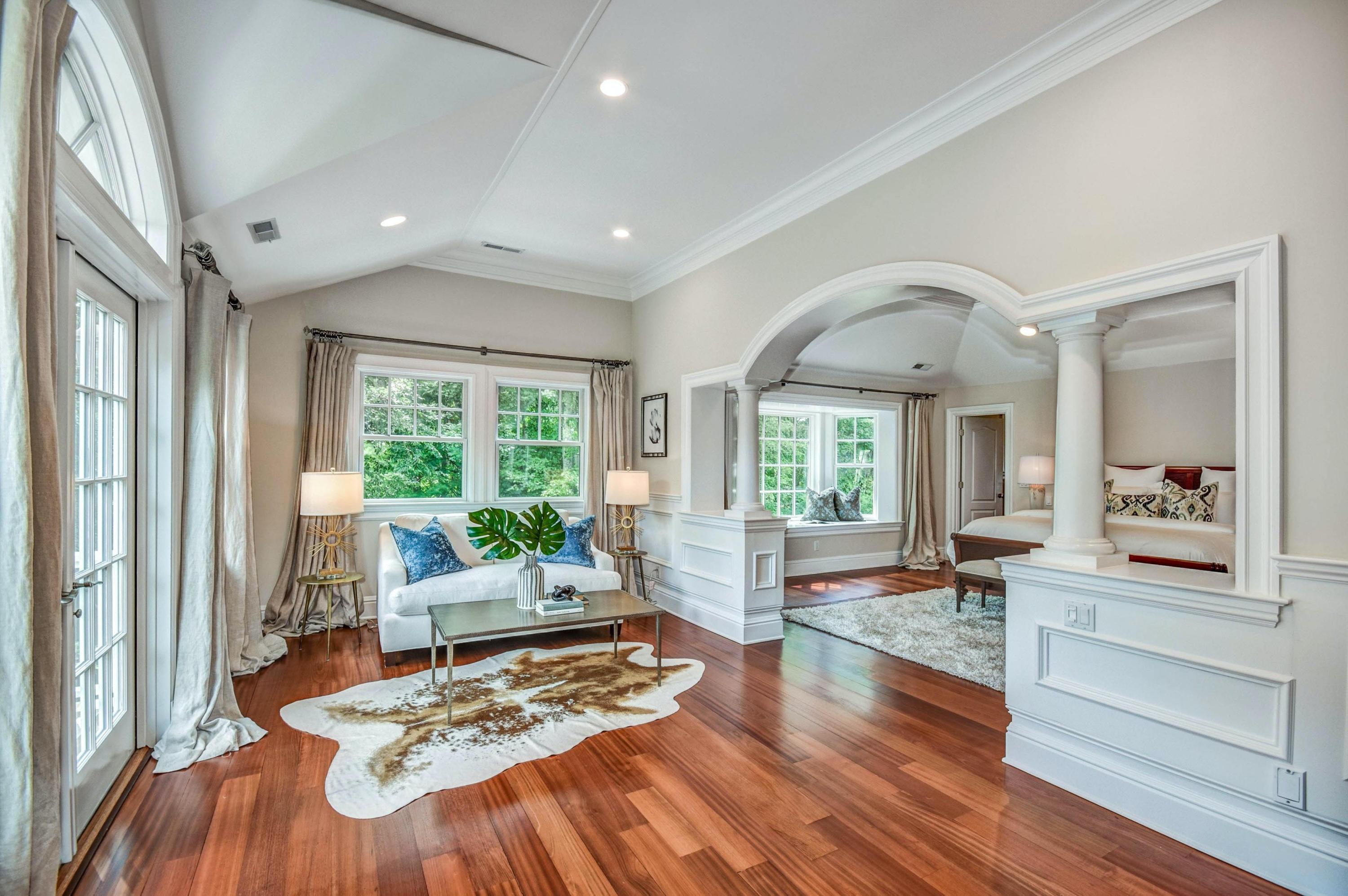 56 Logan Road New Canaan, CT 06840 - Photo 24 of 40 a living room with furniture and large windows