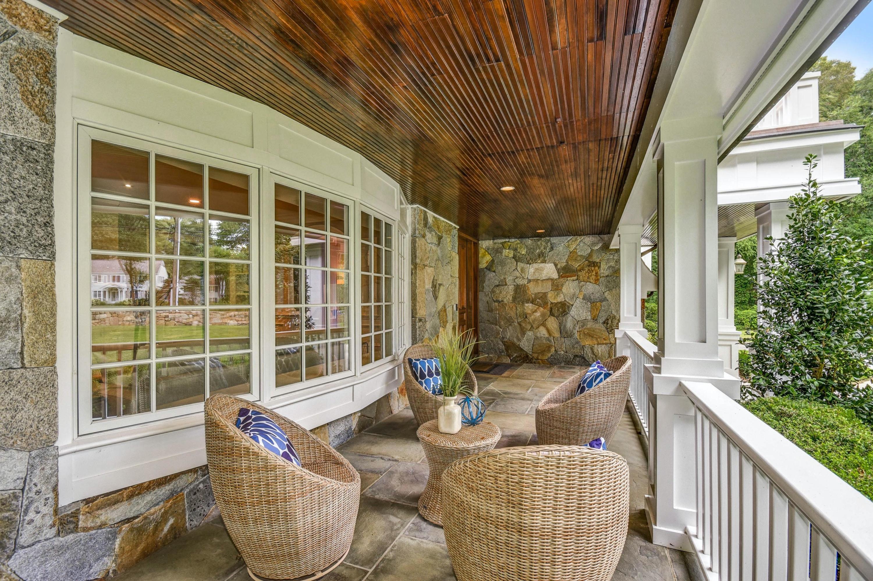 56 Logan Road New Canaan, CT 06840 - Photo 4 of 40 a view of balcony with couch