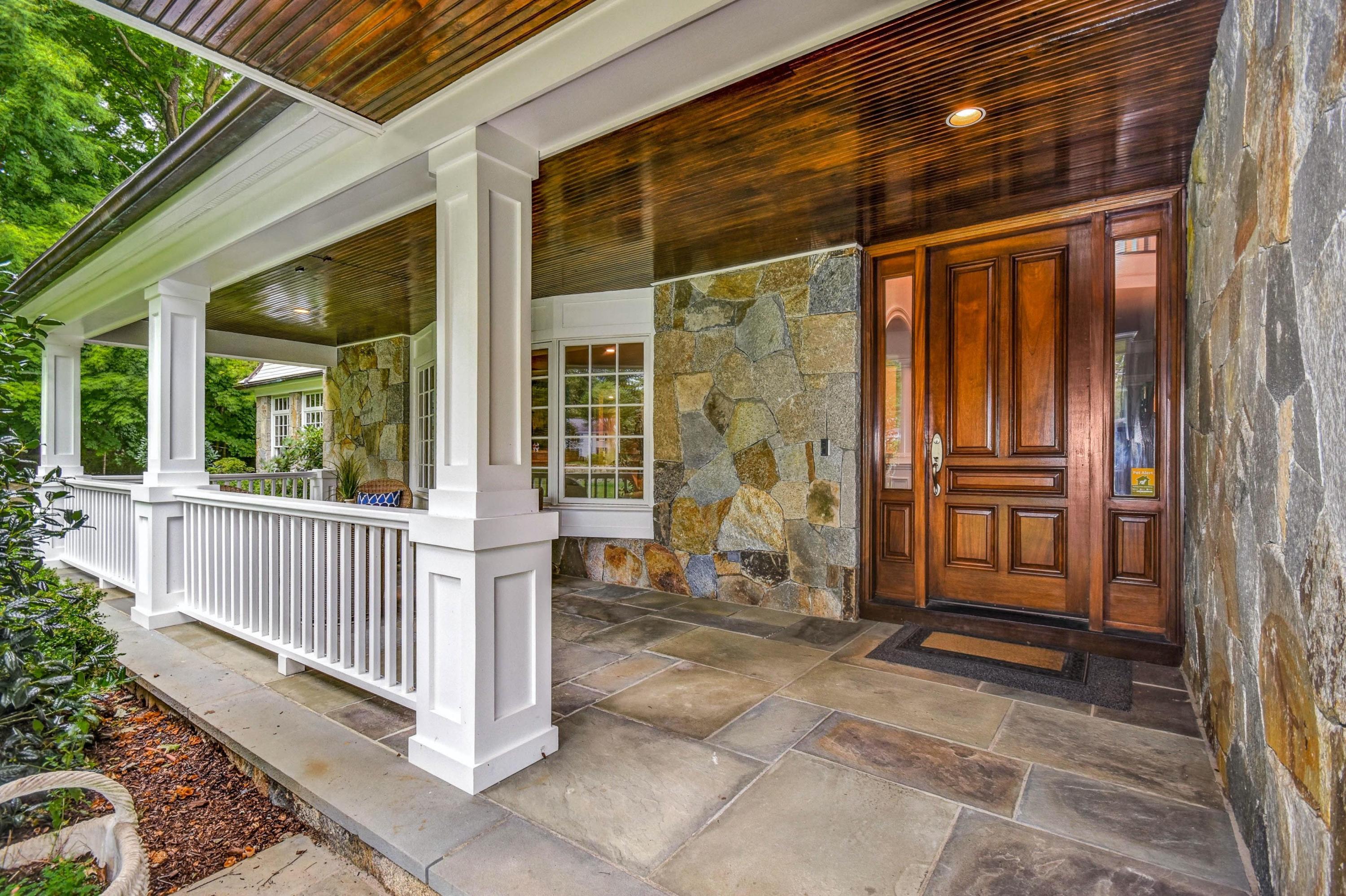 56 Logan Road New Canaan, CT 06840 - Photo 5 of 40 a view of front door of house