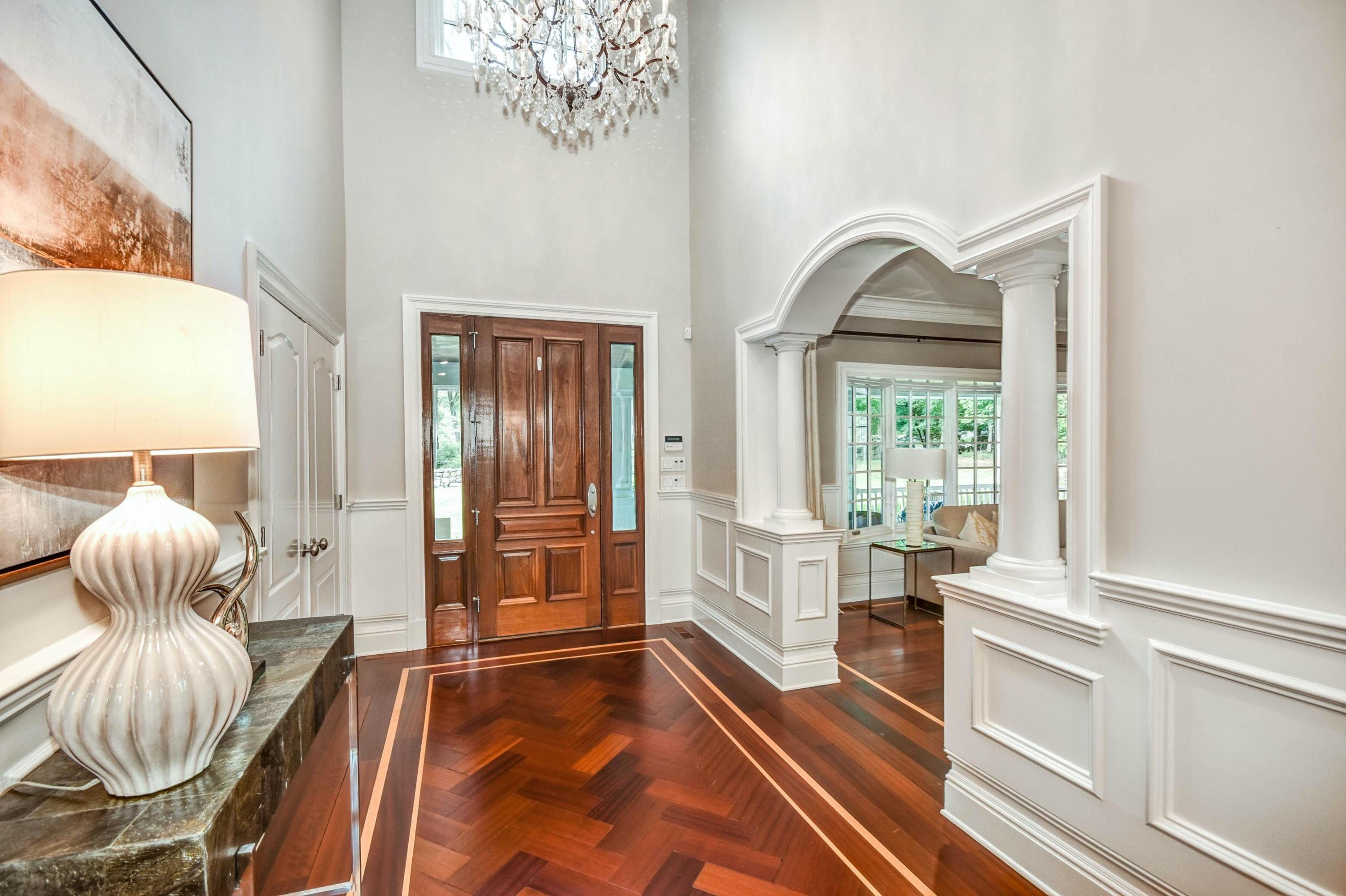 56 Logan Road New Canaan, CT 06840 - Photo 6 of 40 a living room with furniture and a large window