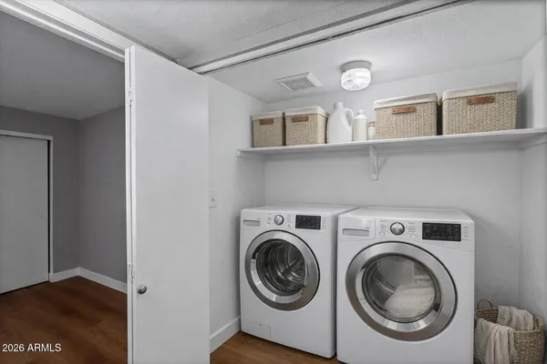 a swimming pool with outdoor seating and yard