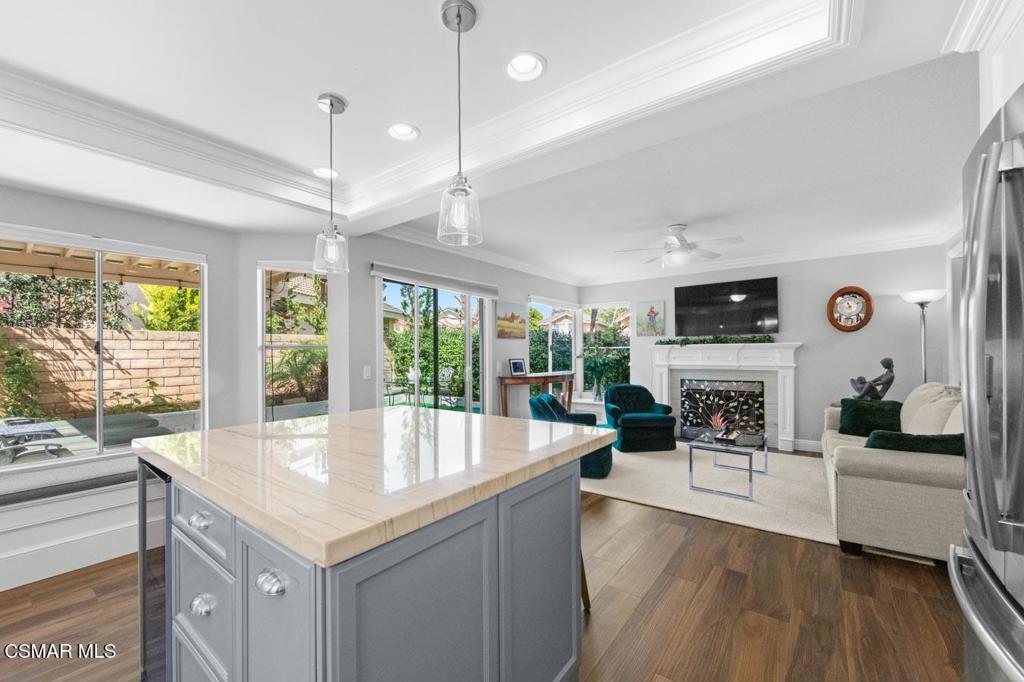 582 Fairfield Road Simi Valley, CA 93065 - Photo 12 of 31 a living room with fireplace furniture and a large window