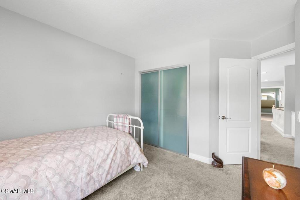 582 Fairfield Road Simi Valley, CA 93065 - Photo 17 of 31 a bedroom with a bed and a window