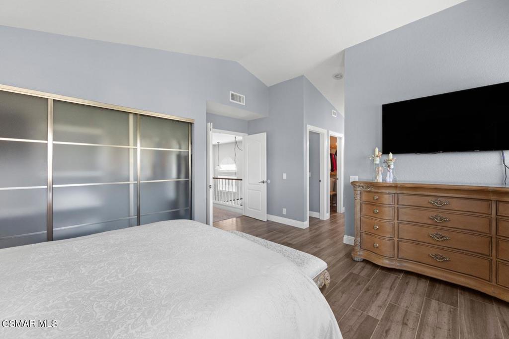 582 Fairfield Road Simi Valley, CA 93065 - Photo 22 of 31 a bedroom with a bed and a flat screen tv