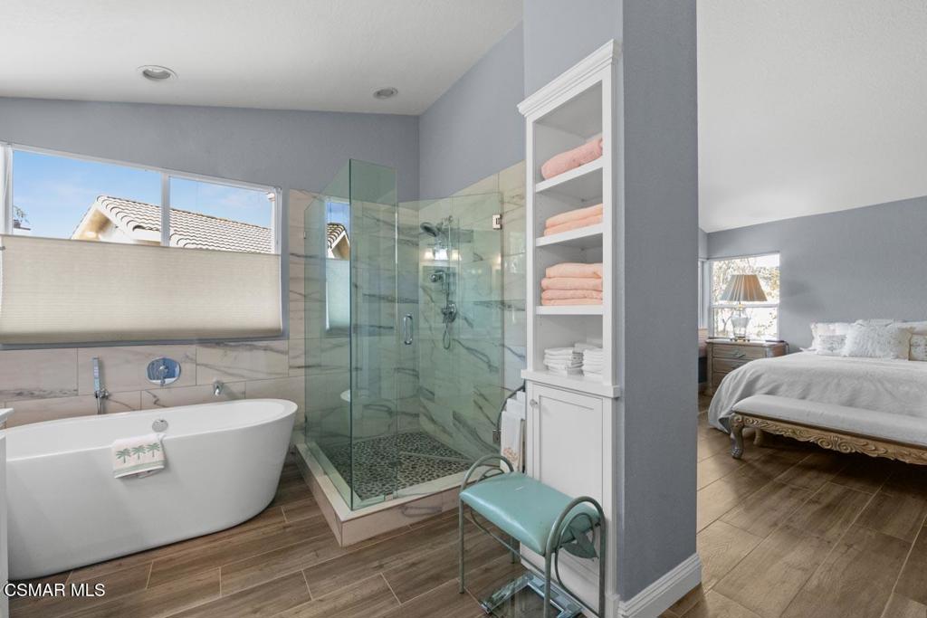 582 Fairfield Road Simi Valley, CA 93065 - Photo 26 of 31 a bathroom with a bathtub and shower