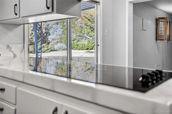 a view of a glass door and front door