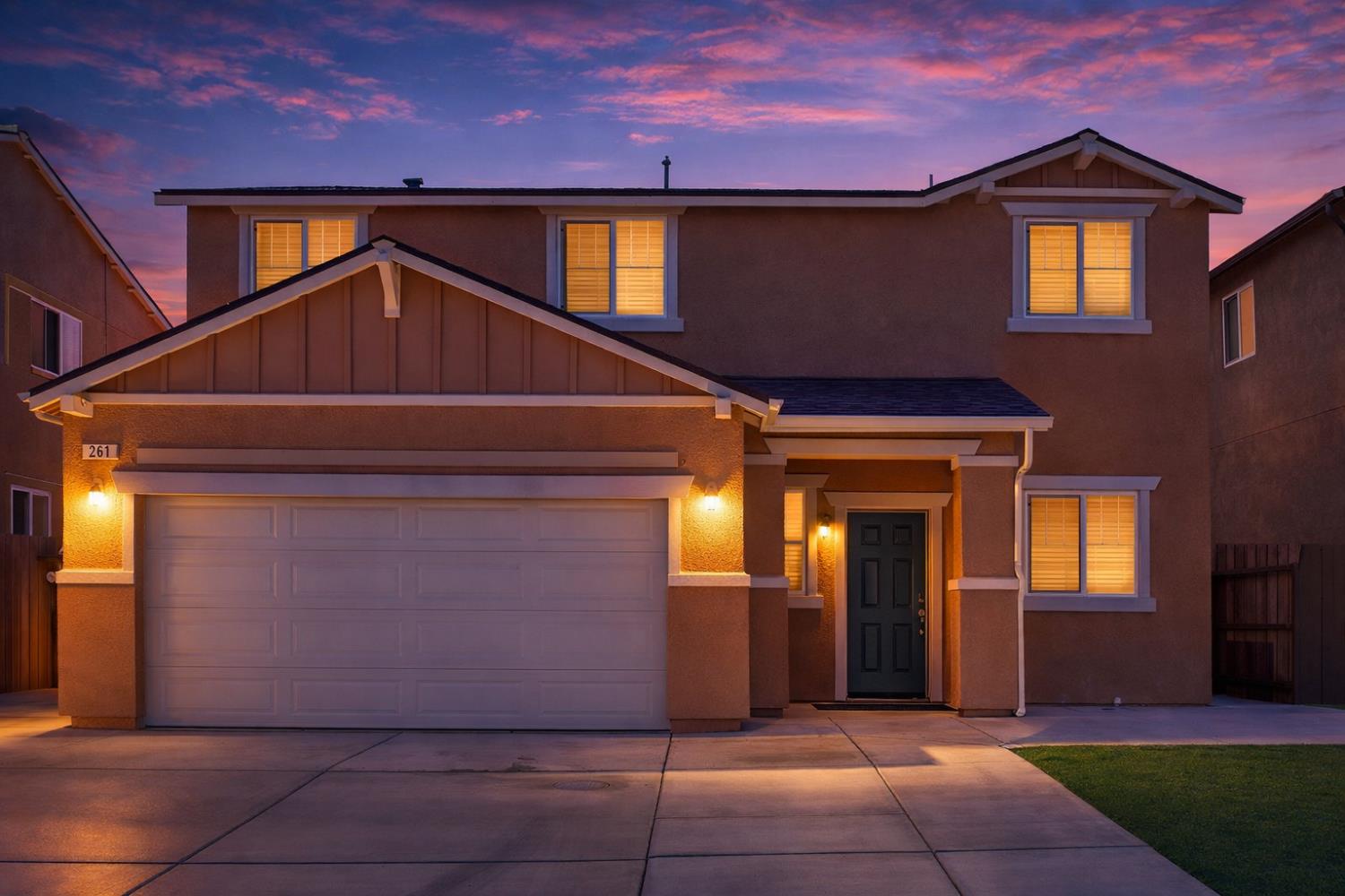 a view of a house with a garage