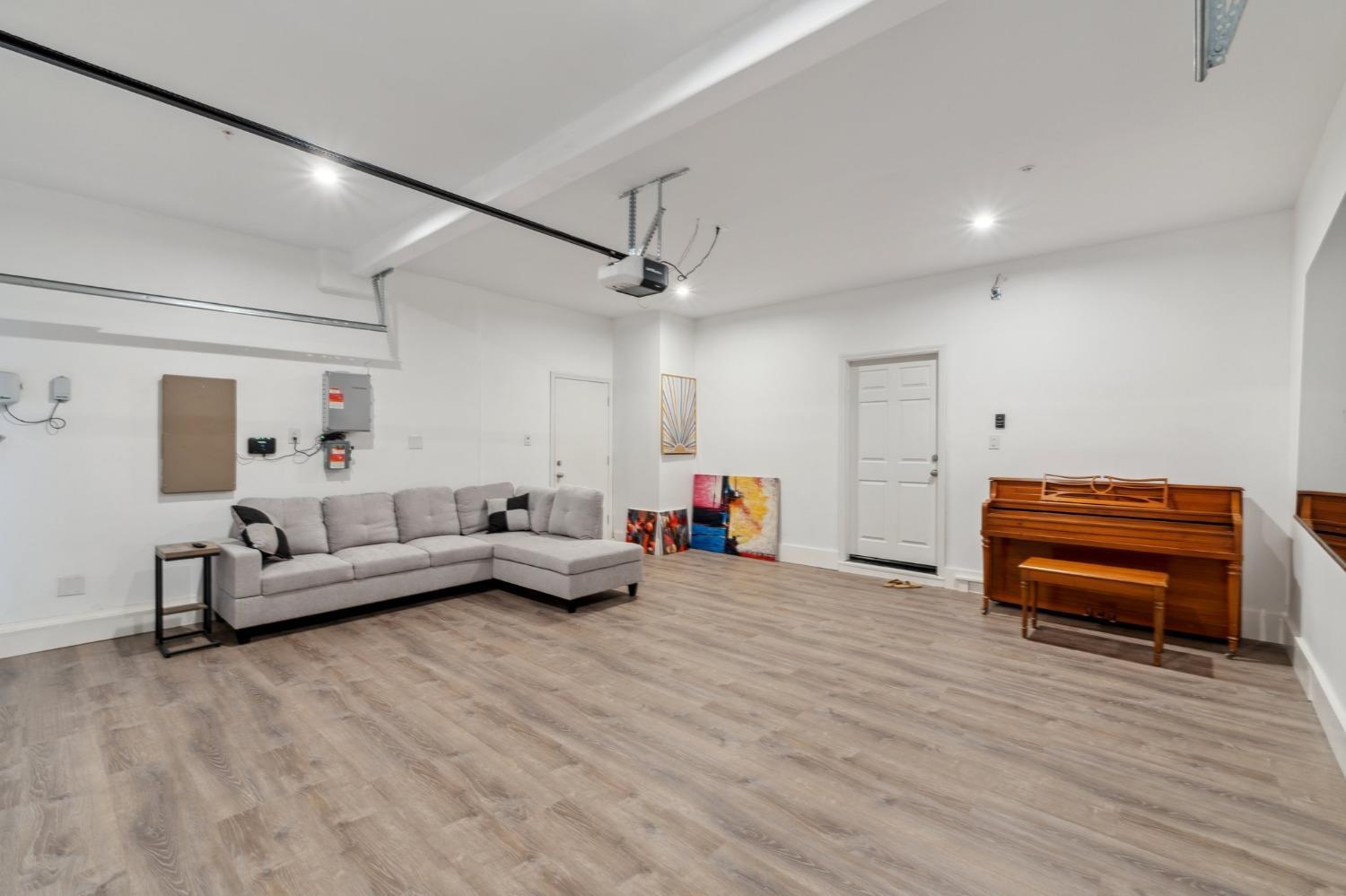 264 Rosebriar Street Madera, CA 93638 - Photo 21 of 28 a living room with furniture and a wooden floor