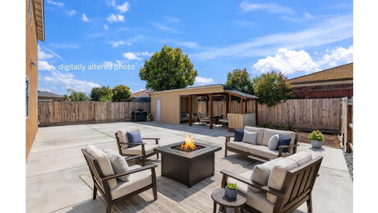 264 Rosebriar Street Madera, CA 93638 - Photo 23 of 28 a outdoor living space with furniture and a garden