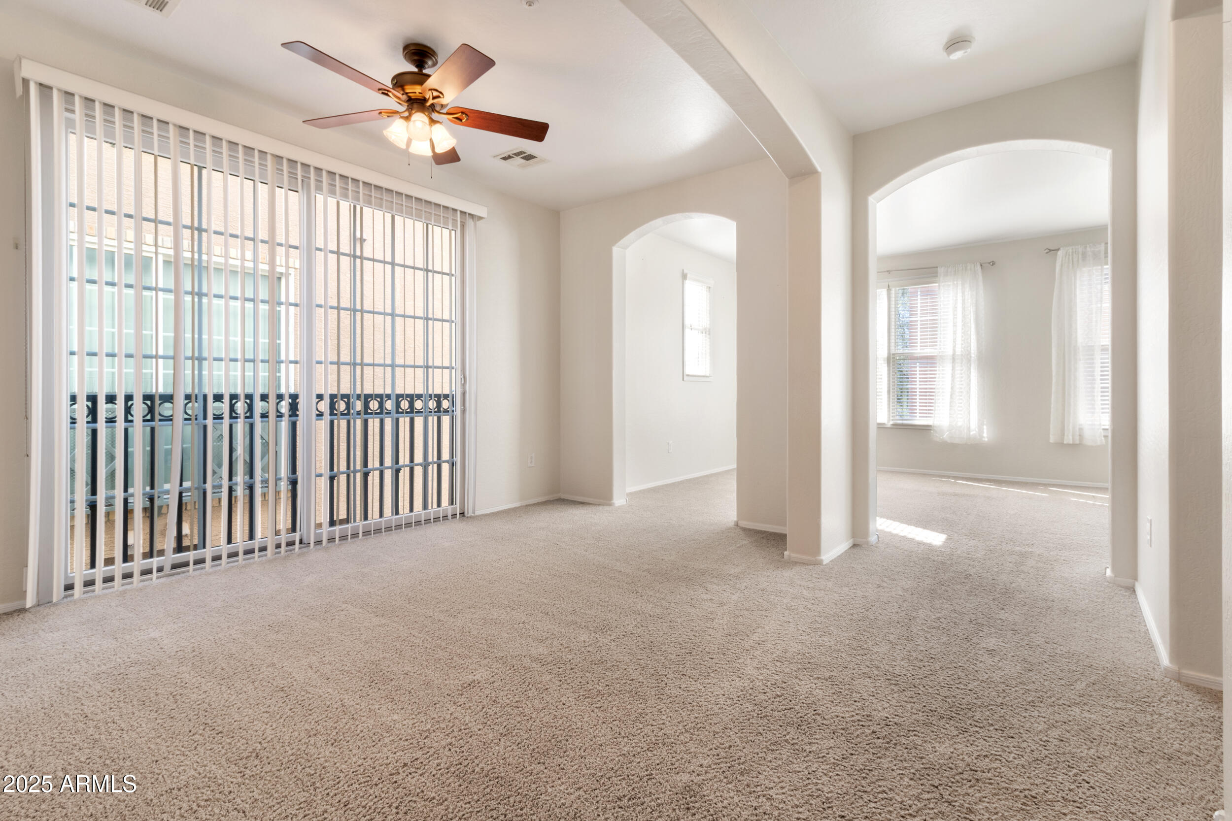 2789 South Key Biscayne Drive Gilbert, AZ 85295 - Photo 13 of 47 en view interior of a house with a ceiling fan and window