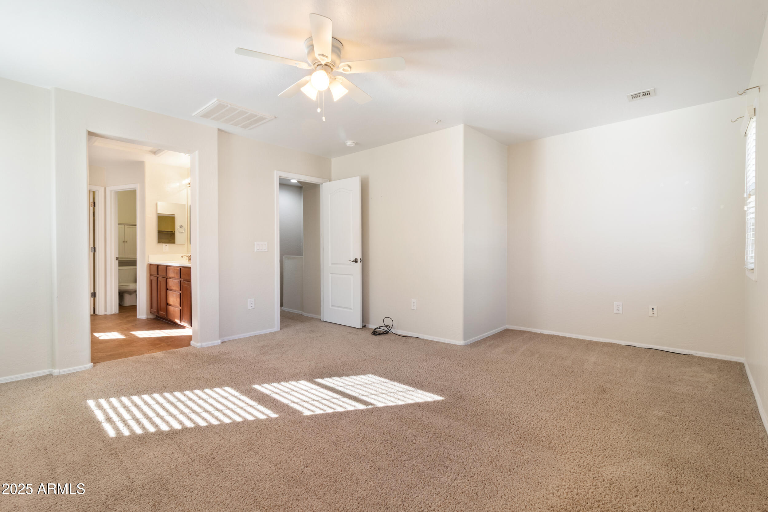 2789 South Key Biscayne Drive Gilbert, AZ 85295 - Photo 20 of 47 an empty room with fan and entrance