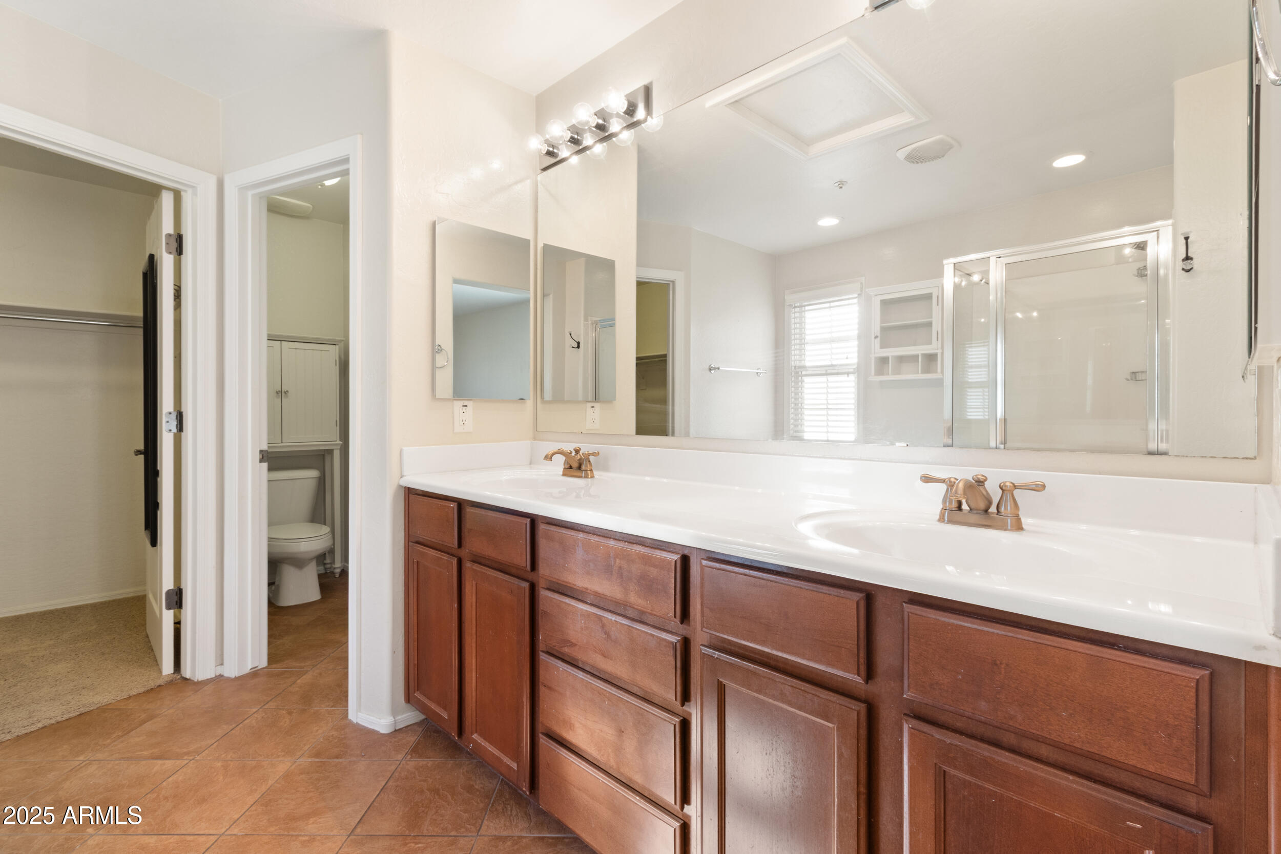 2789 South Key Biscayne Drive Gilbert, AZ 85295 - Photo 22 of 47 a bathroom with a double vanity sink mirror and double