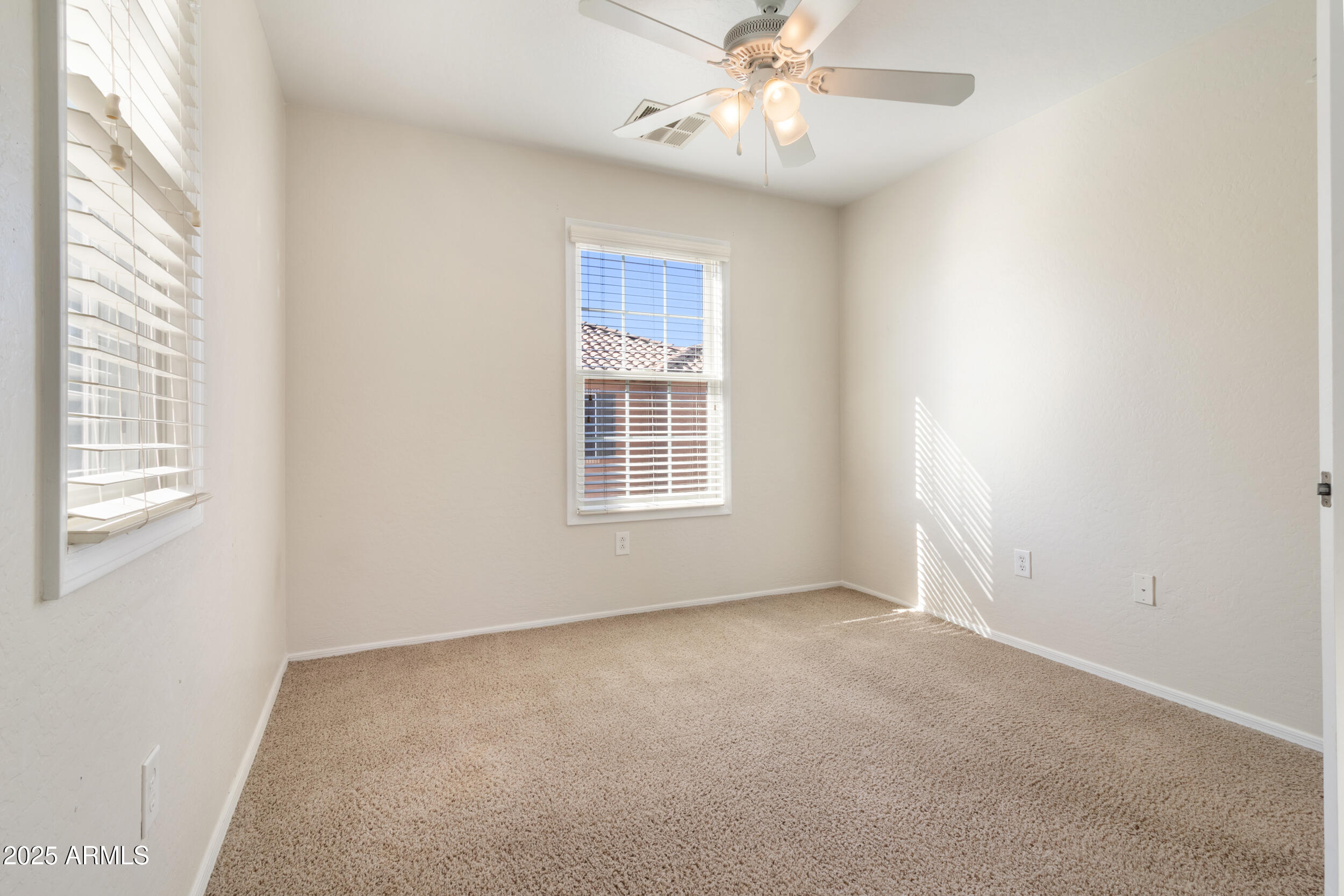 2789 South Key Biscayne Drive Gilbert, AZ 85295 - Photo 26 of 47 a view of an empty room with a window