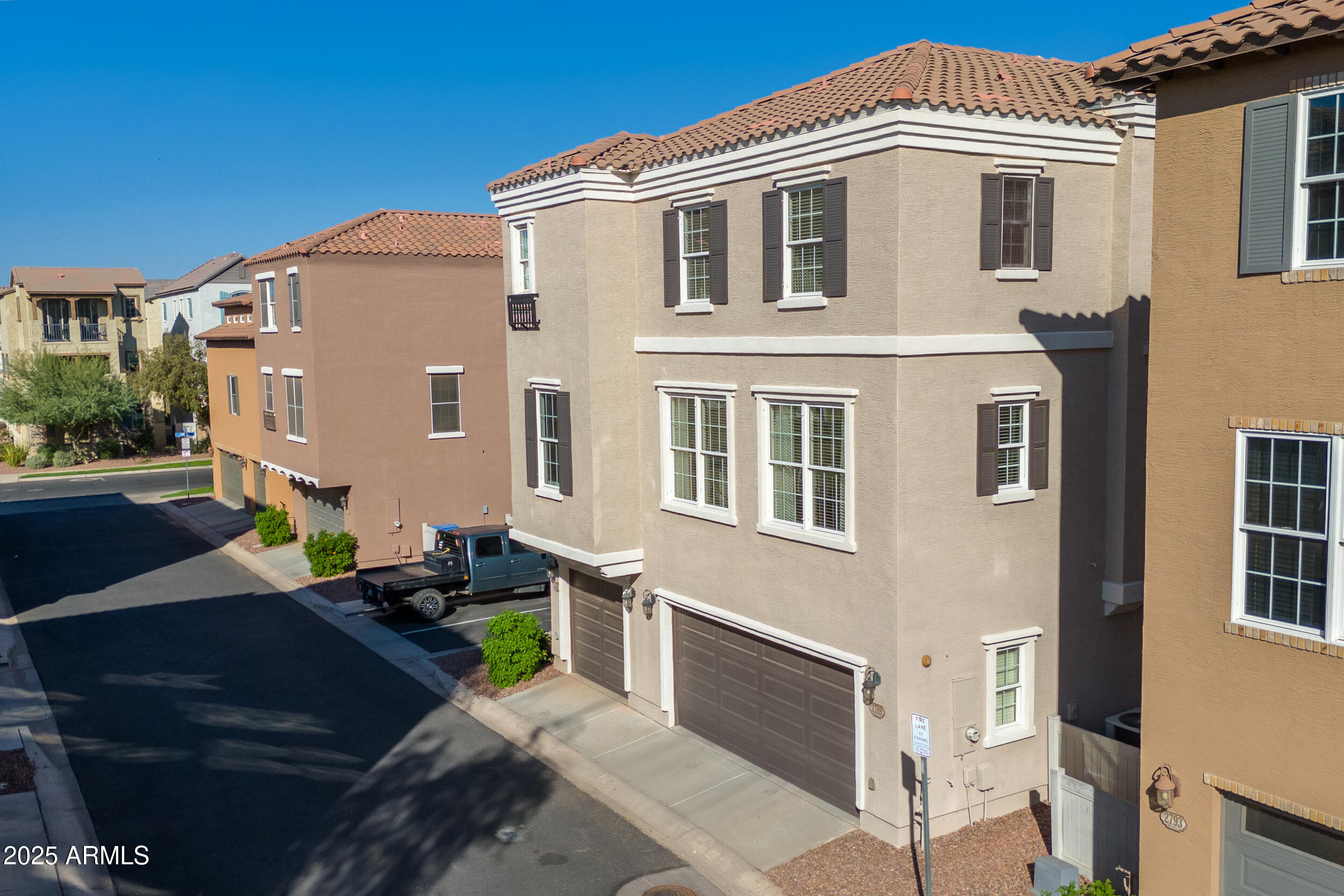 2789 South Key Biscayne Drive Gilbert, AZ 85295 - Photo 30 of 47 a front view of a house with outdoor seating