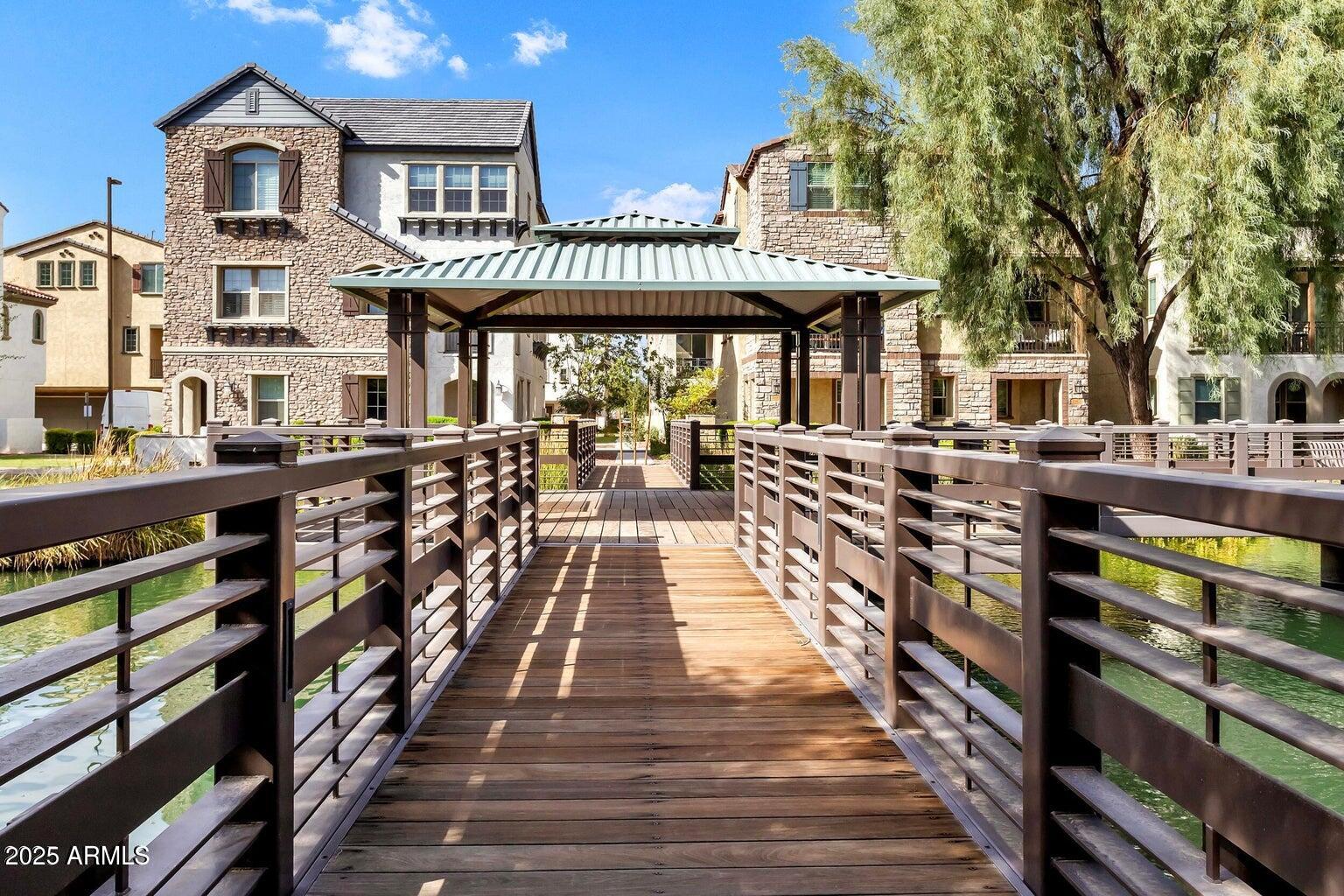 2789 South Key Biscayne Drive Gilbert, AZ 85295 - Photo 46 of 47 a view of a building with a lot of windows
