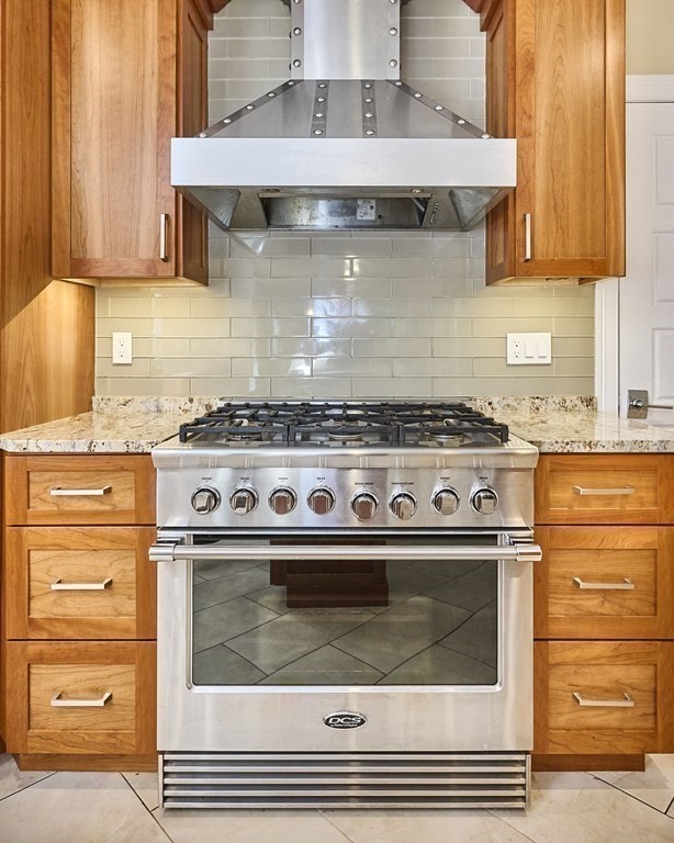 107 Concord Way Amherst, MA 01002 - Photo 17 of 41 a stove top oven sitting inside of a kitchen