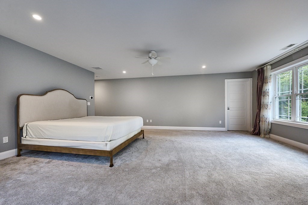107 Concord Way Amherst, MA 01002 - Photo 20 of 41 a bedroom with a bed and a window