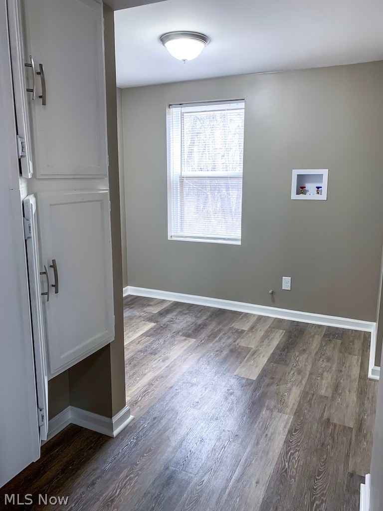 6844 Henderson Road Ravenna, OH 44266 - Photo 16 of 24 First-Floor Laundry with Storage Cabinet.