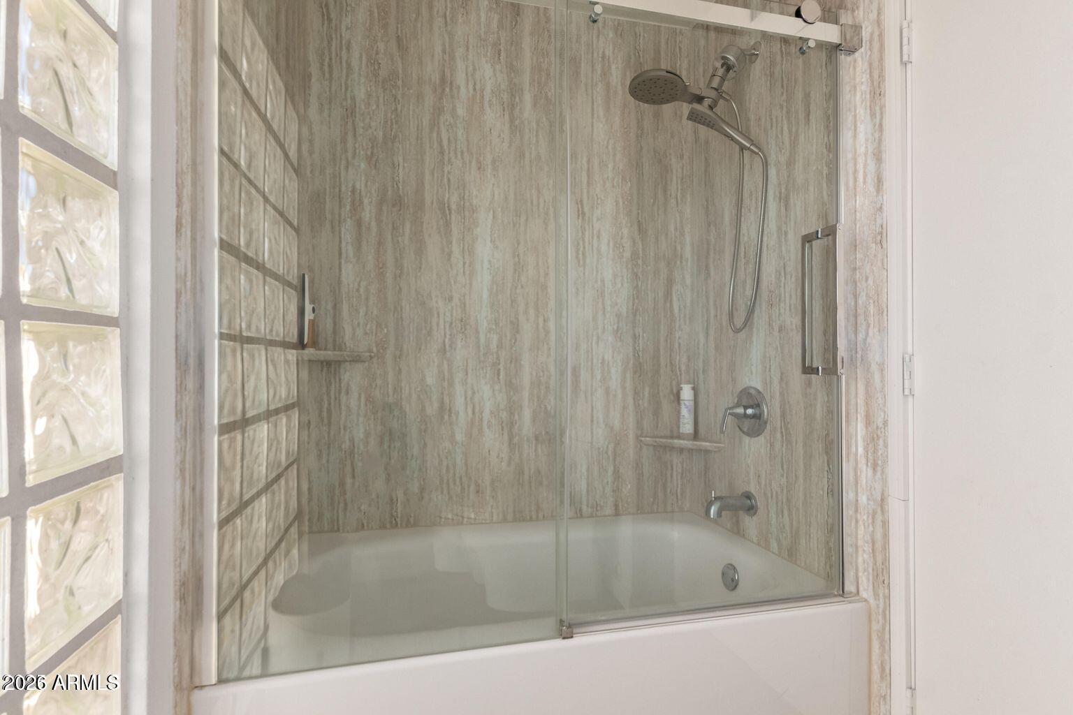 1301 West Rio Salado Parkway, Unit 51 Mesa, AZ 85201 - Photo 16 of 30 a bath tub sitting next to a shower