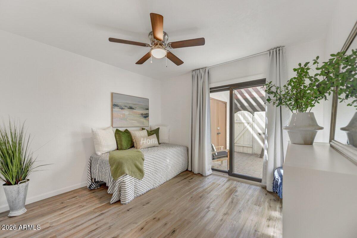 1301 West Rio Salado Parkway, Unit 51 Mesa, AZ 85201 - Photo 18 of 30 a bedroom with a bed and a potted plant