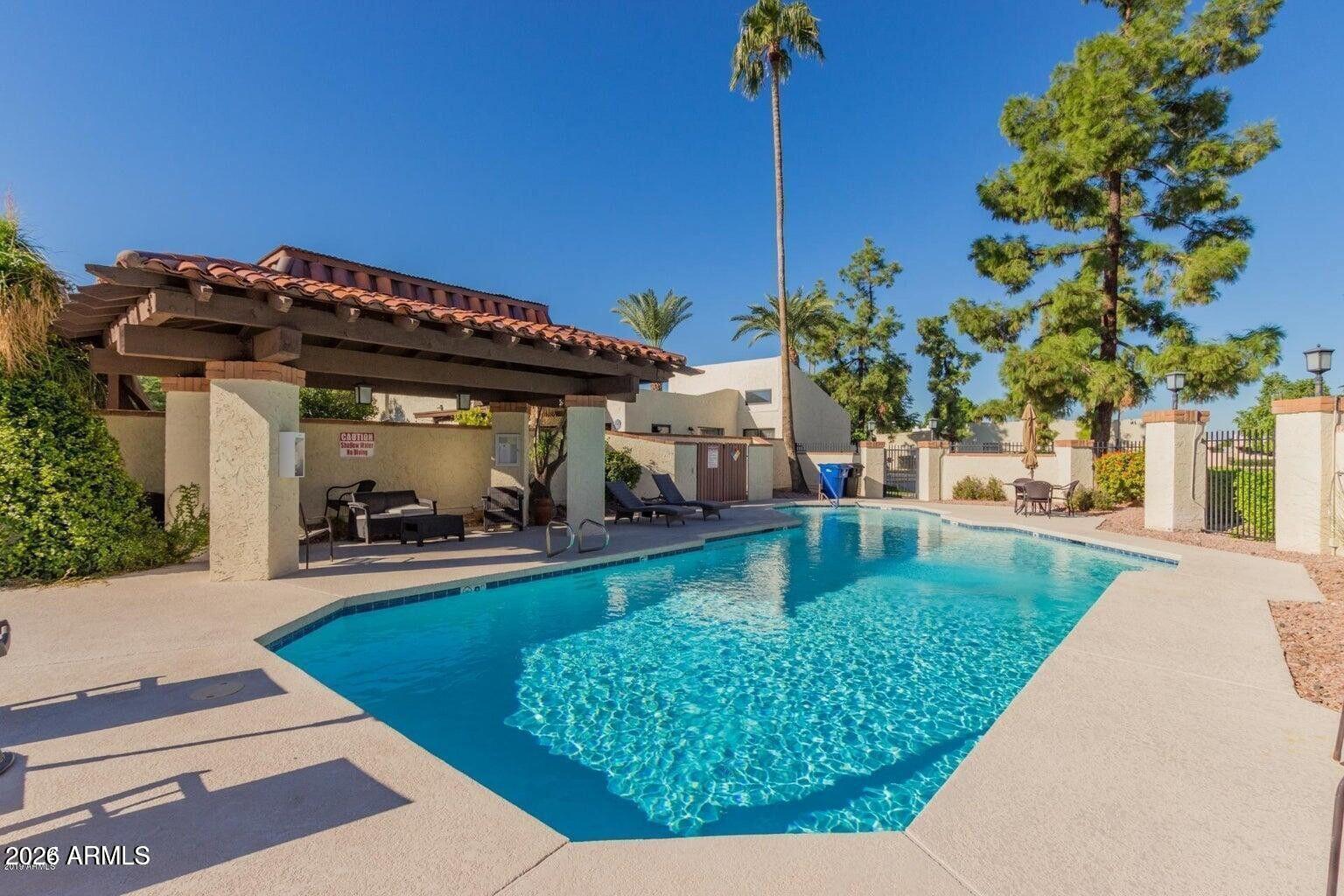 1301 West Rio Salado Parkway, Unit 51 Mesa, AZ 85201 - Photo 25 of 30 a view of a house with backyard