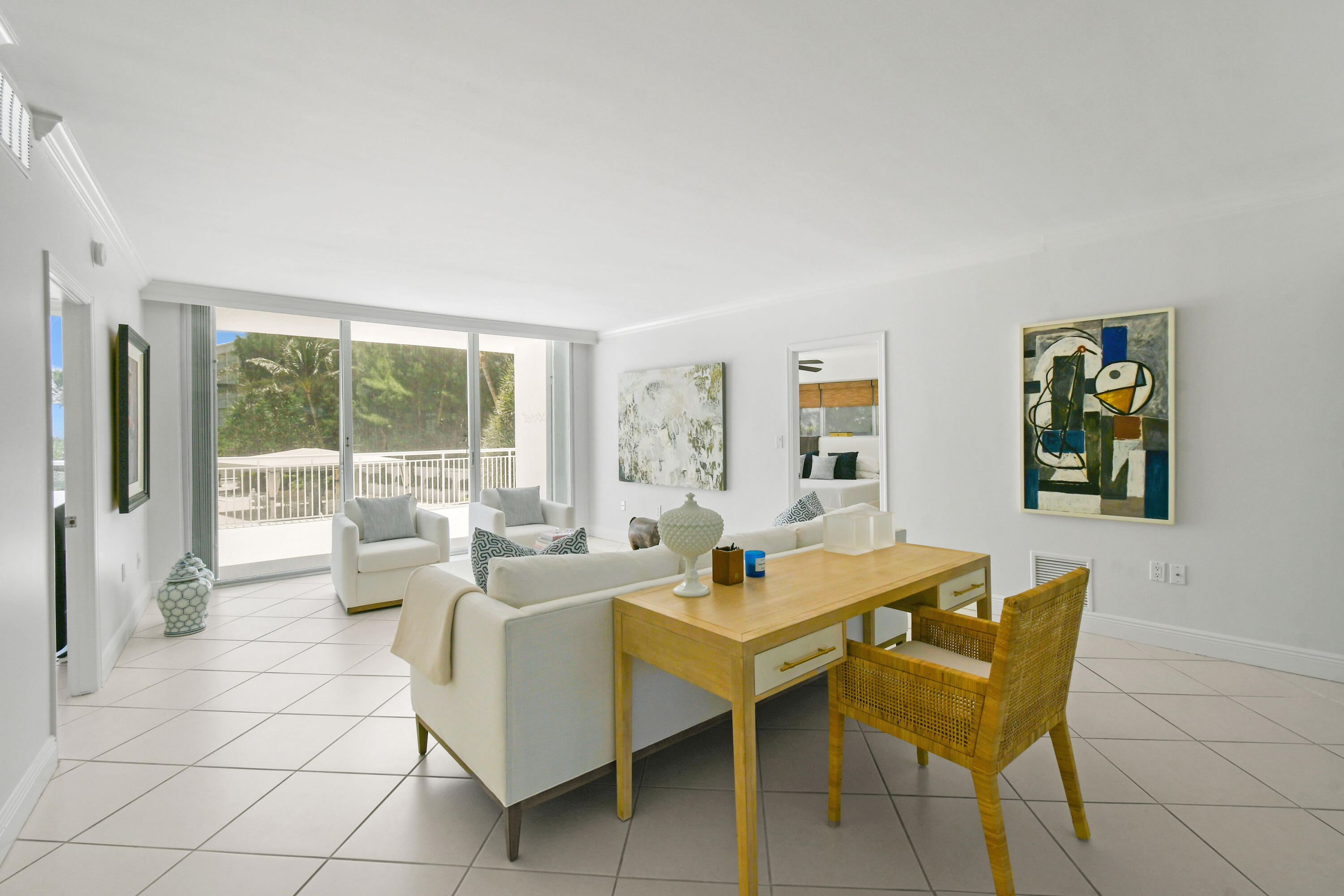 2780 South Ocean Boulevard, Unit 112 Palm Beach, FL 33480 - Photo 3 of 55 a living room with furniture and a large window