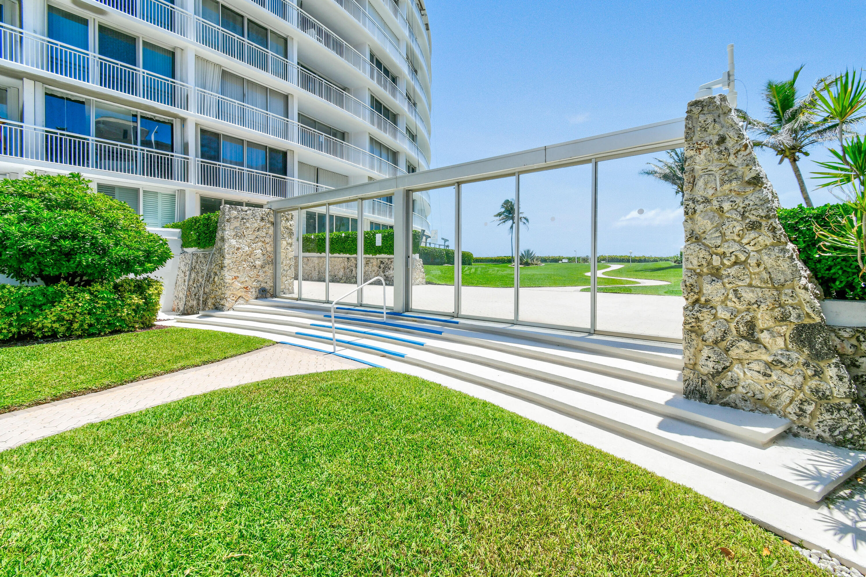 2780 South Ocean Boulevard, Unit 112 Palm Beach, FL 33480 - Photo 34 of 55 a view of building with yard