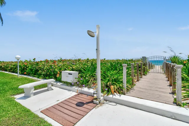 a view of a balcony next to an ocean