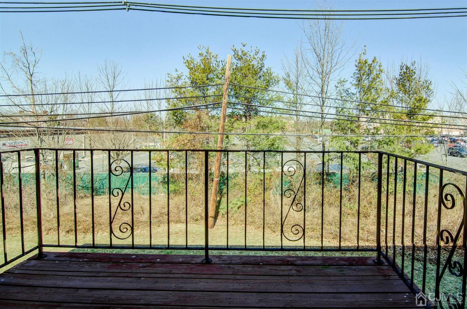 199 Evergreen Road, Unit 4B Edison, NJ 08837 - Photo 15 of 28 a view of swimming pool from a balcony