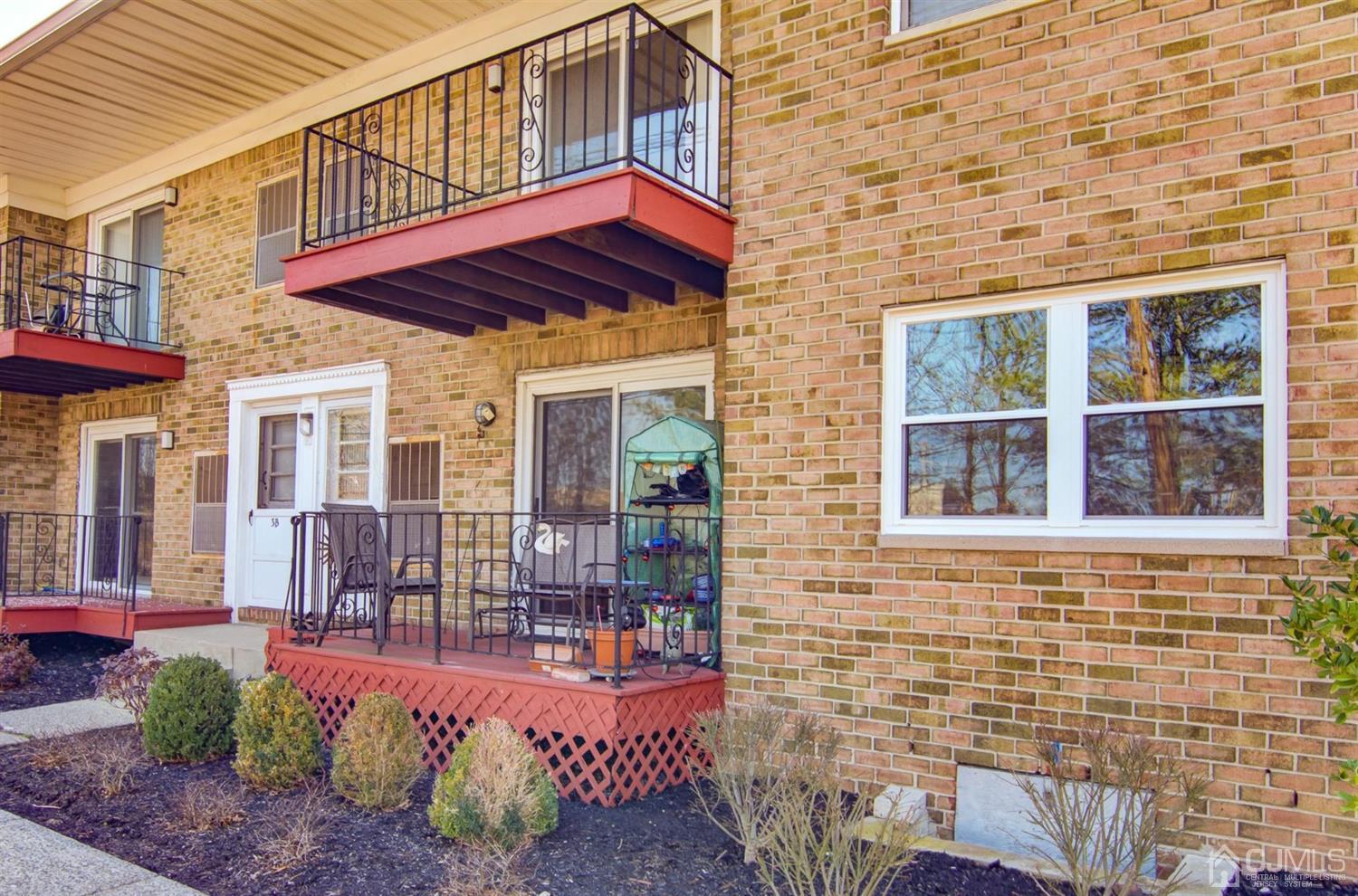 199 Evergreen Road, Unit 4B Edison, NJ 08837 - Photo 16 of 28 a view of front a house with outdoor seating
