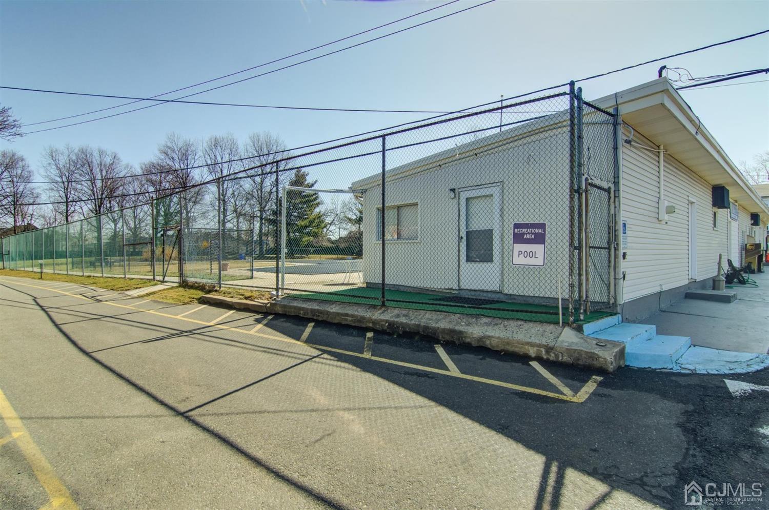 199 Evergreen Road, Unit 4B Edison, NJ 08837 - Photo 18 of 28 a view of a house with a backyard