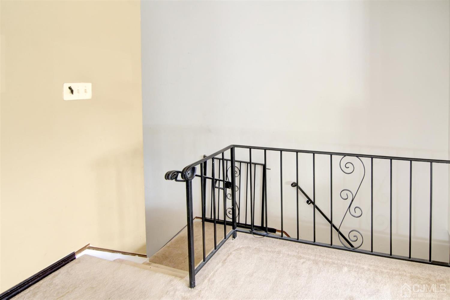 199 Evergreen Road, Unit 4B Edison, NJ 08837 - Photo 3 of 28 a view of a staircase