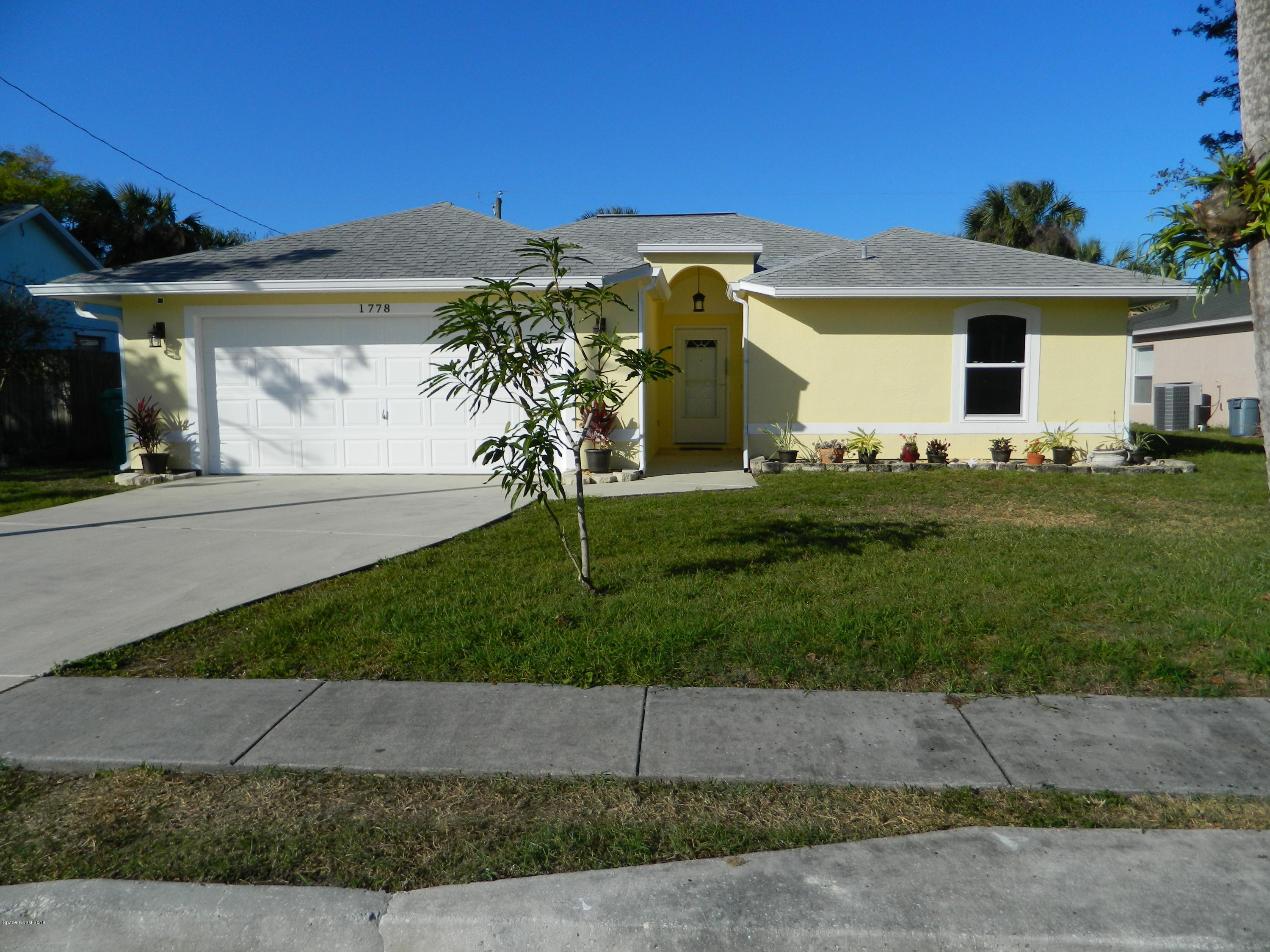 1778 Palm Ridge Road Melbourne, FL 32935 - Photo 1 of 19 Front Home View