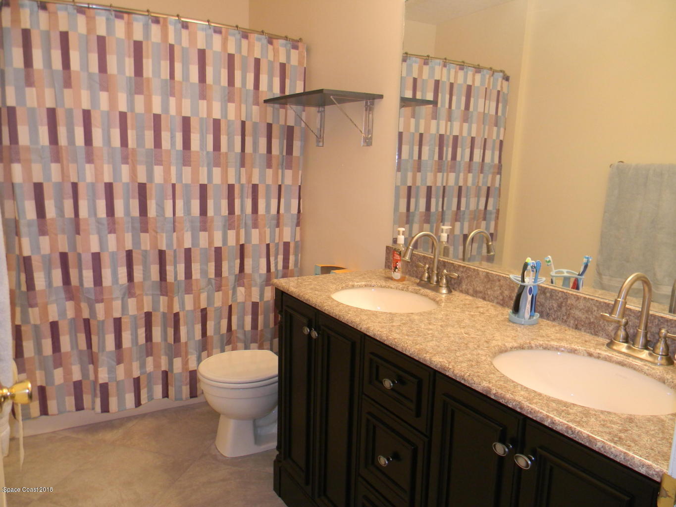 1778 Palm Ridge Road Melbourne, FL 32935 - Photo 14 of 19 2nd Full Bath w/tub,shower