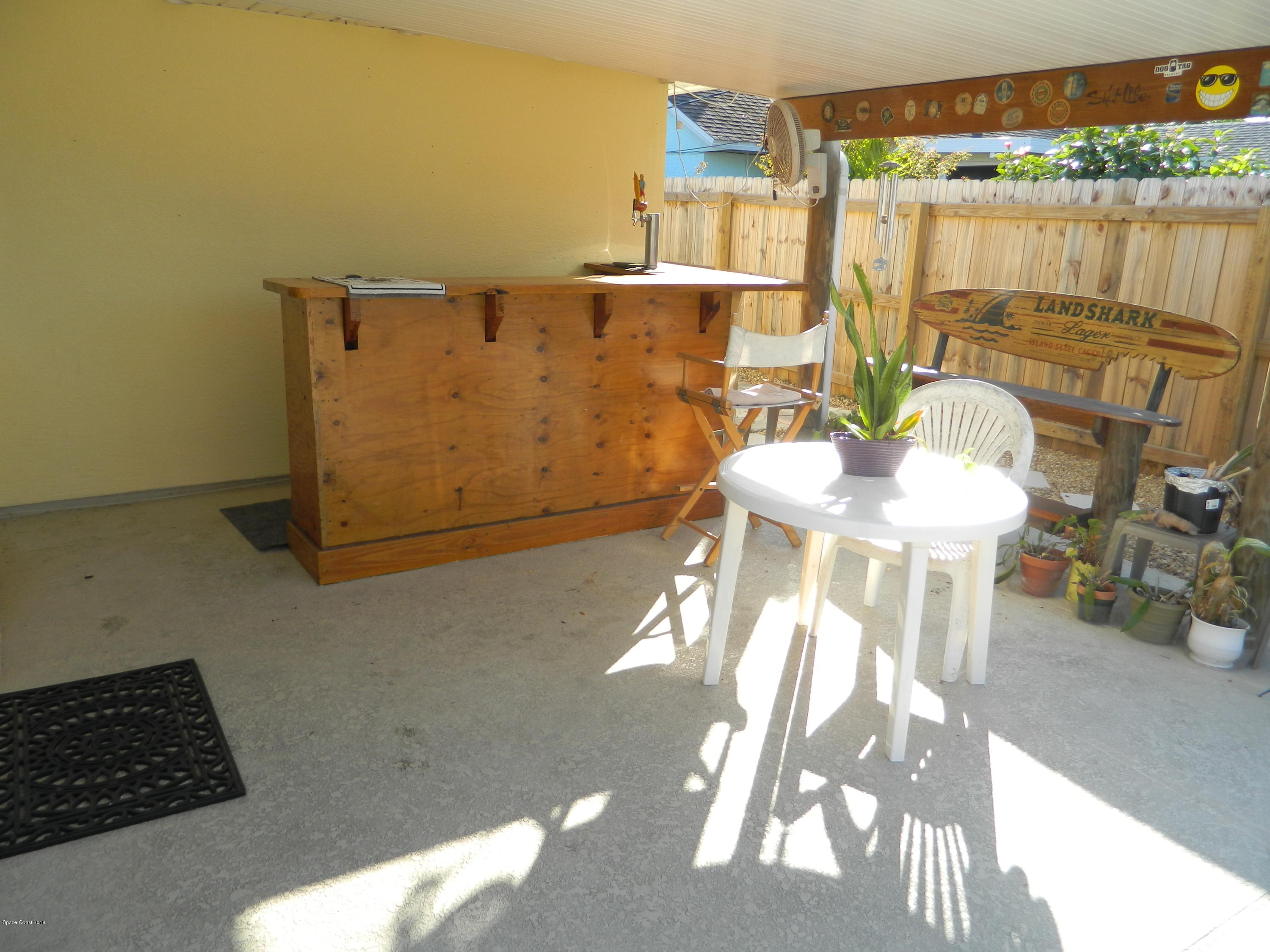 1778 Palm Ridge Road Melbourne, FL 32935 - Photo 18 of 19 Covered Patio w/wet bar